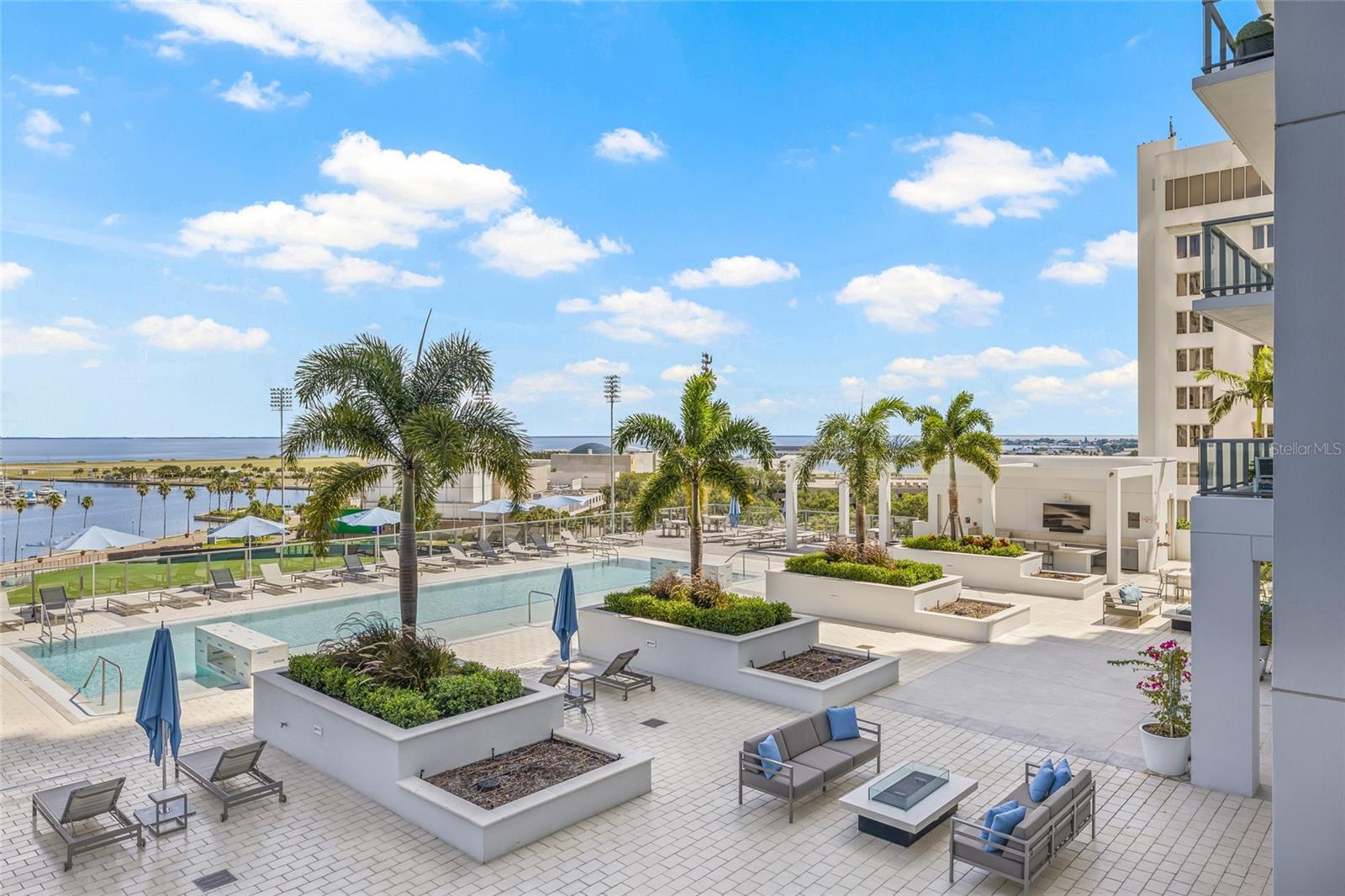 The pool deck also features cozy fire pits and TVs, creating the perfect setting for entertaining guests and enjoying a true luxury experience!