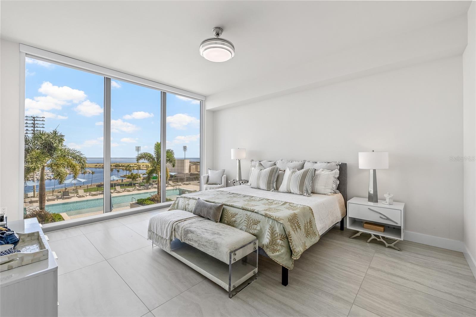 Large Primary Suite that overlooks the tropical pool and Tampa Bay.  Feel like you are on vacation at a resort!