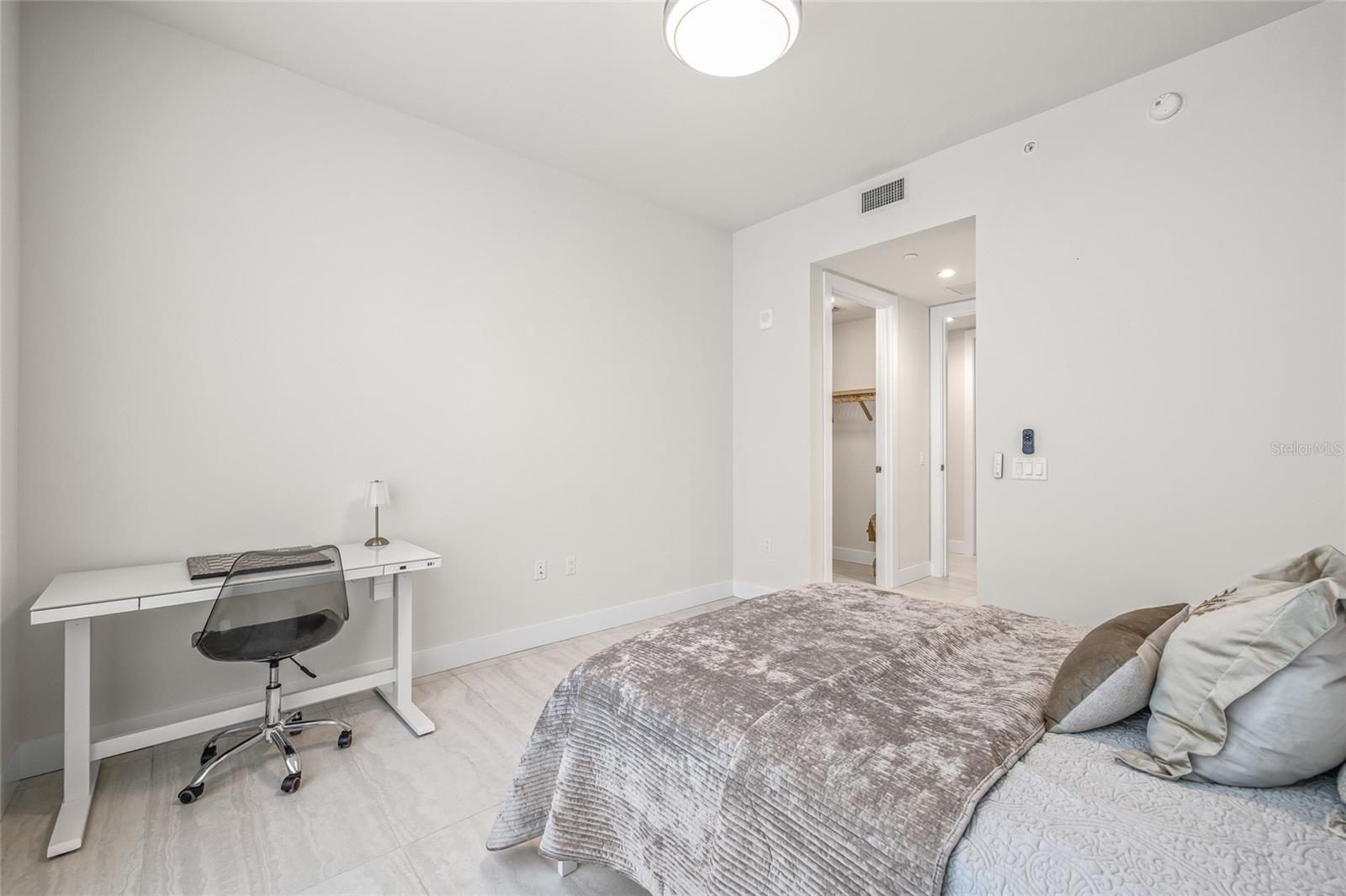 Bedroom #2 includes a spacious walk-in closet, providing good storage