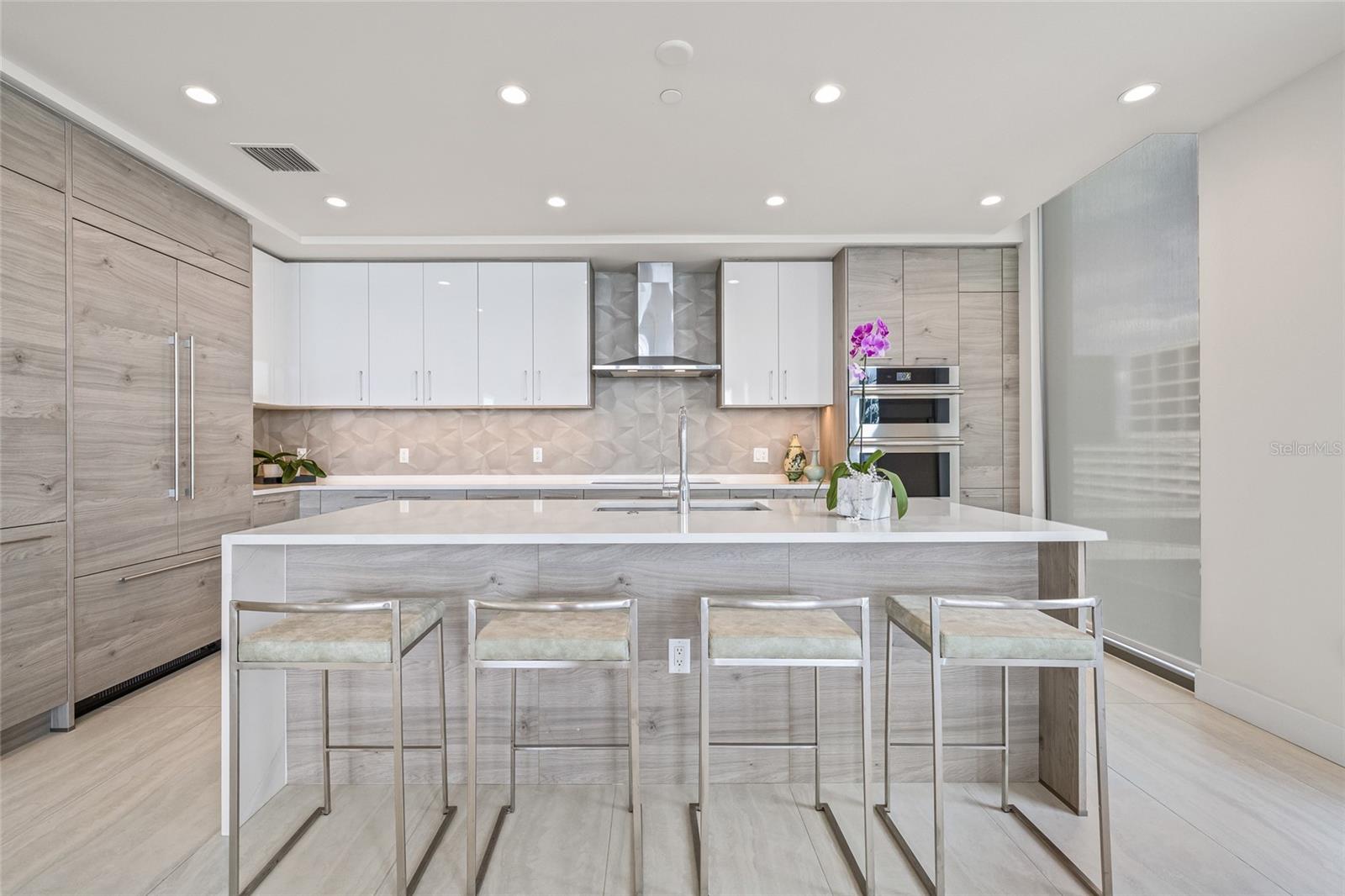 The spacious island allows seating for four