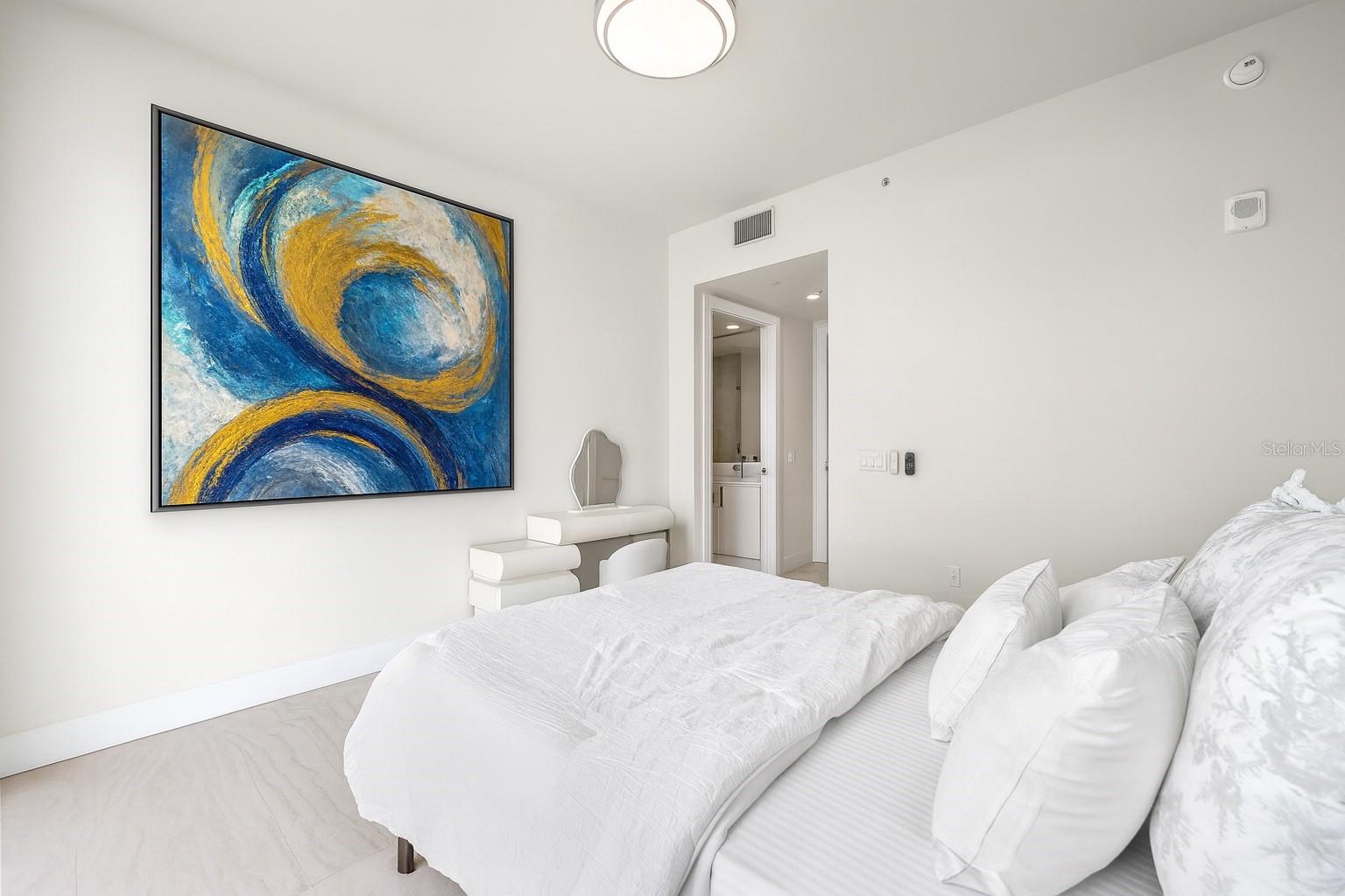 Bedroom #3 features its own en suite bath and a spacious closet, making it an ideal guest retreat!