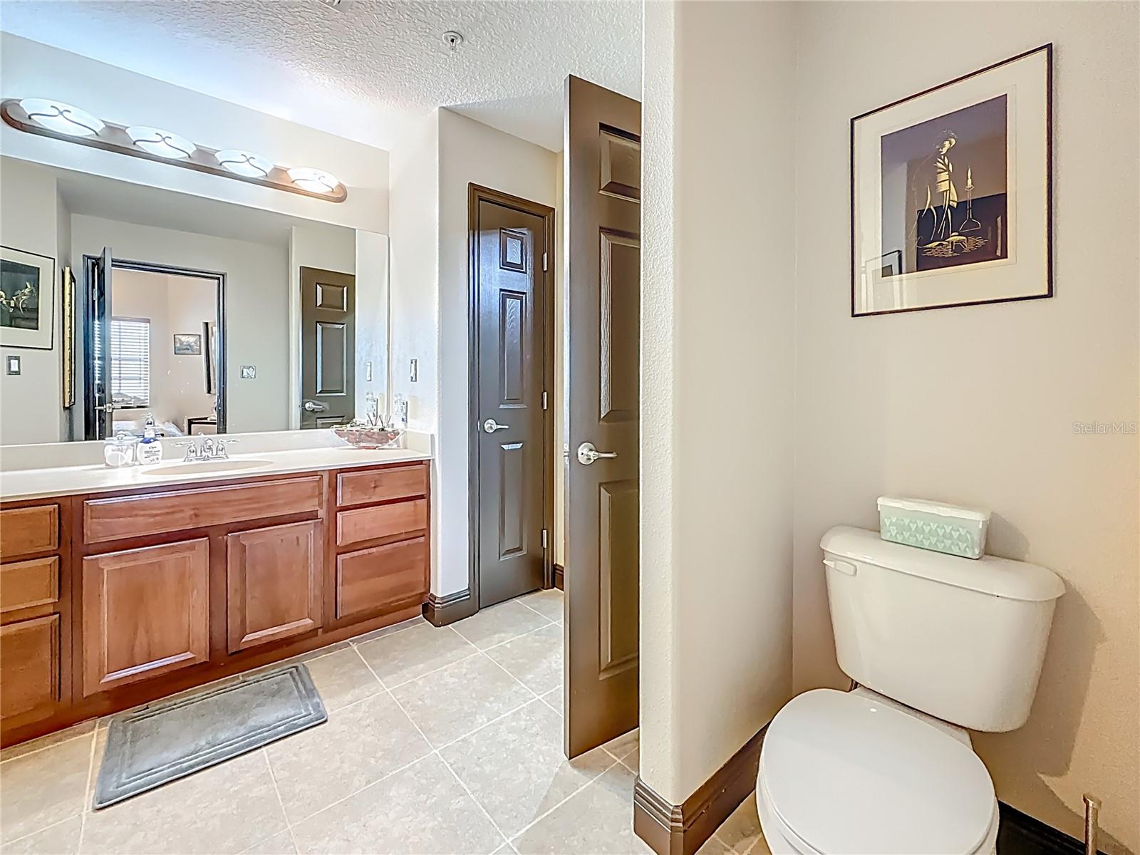 Guest Bathroom with door to hallway & Bedroom #2