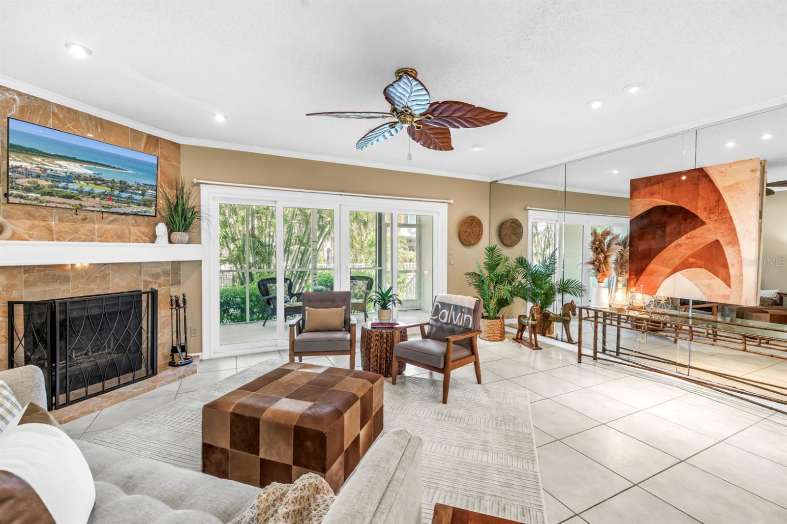Great Room with Fireplace Leading to Screened Patio