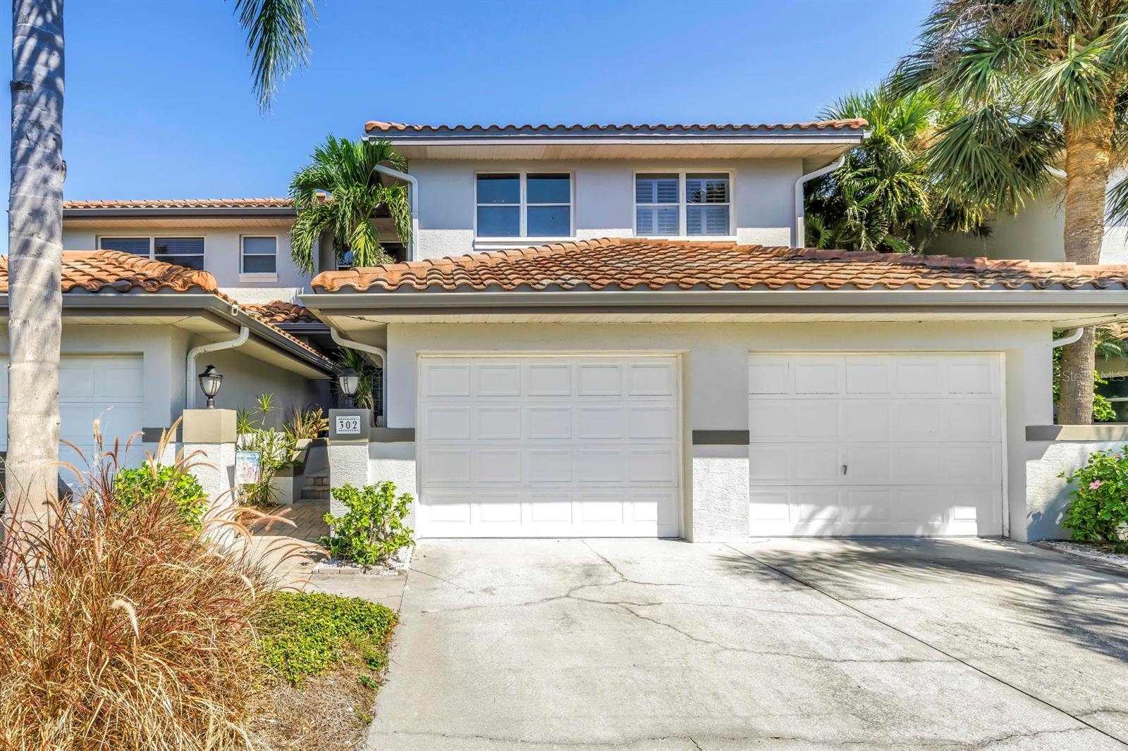 5. Welcome Home to Your Private Driveway and One Car Garage with Electric Opener