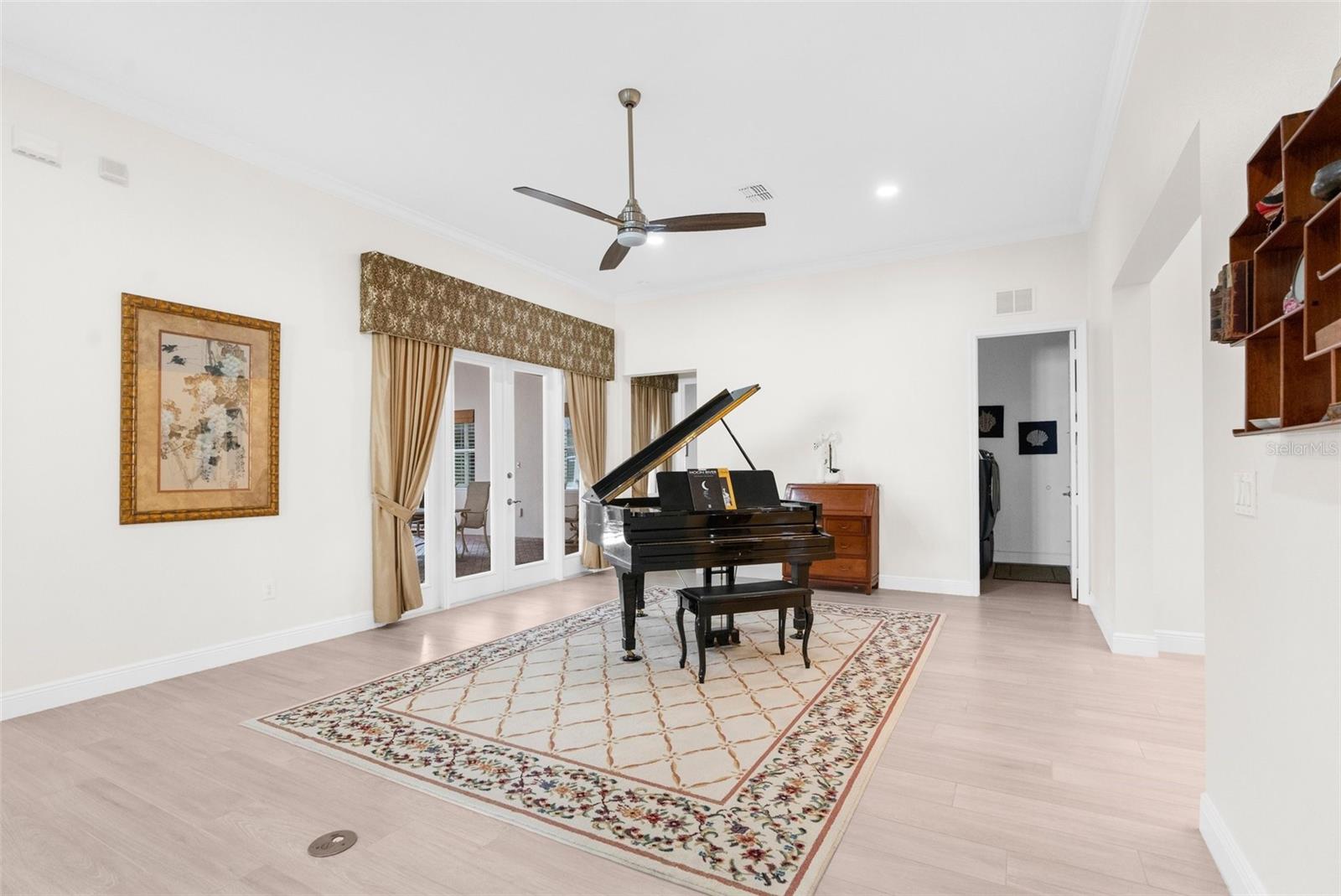Huge living room with 12 foot high ceilings throughout the whole house.