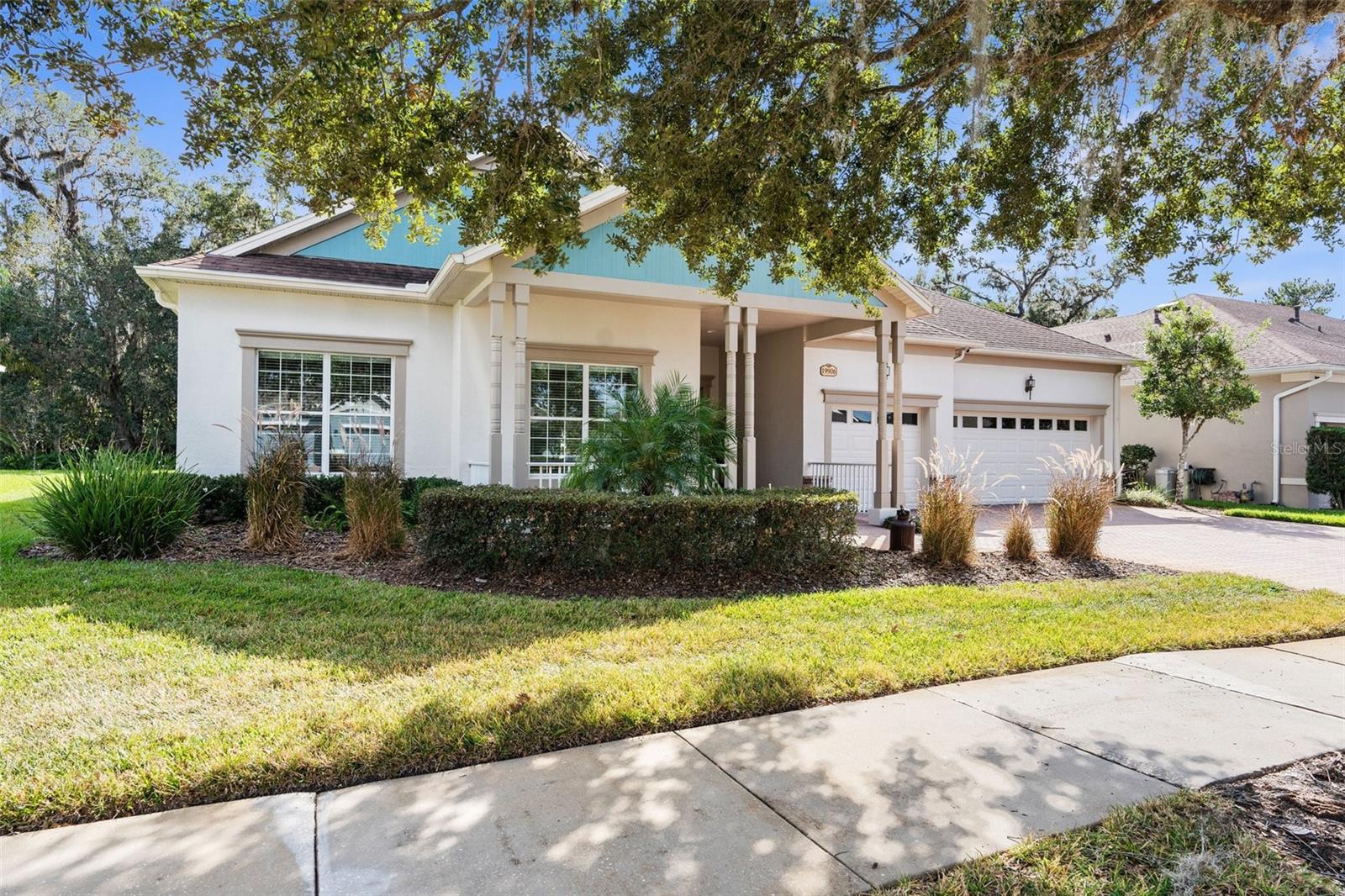 Front of house with sidewalk.