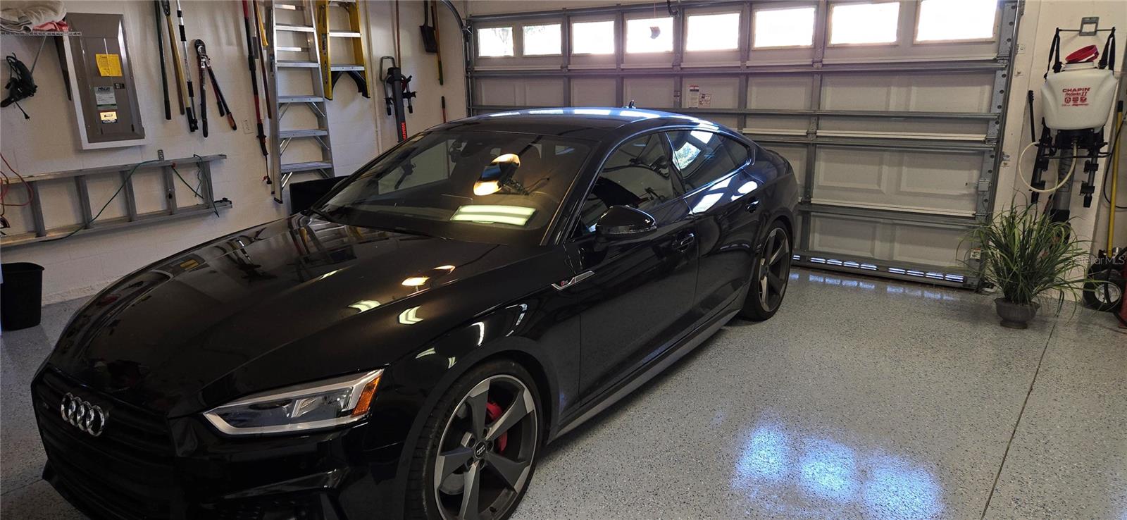 Epoxy Garage Floor. Easily fit 2 large cars/SUVs and one small car.