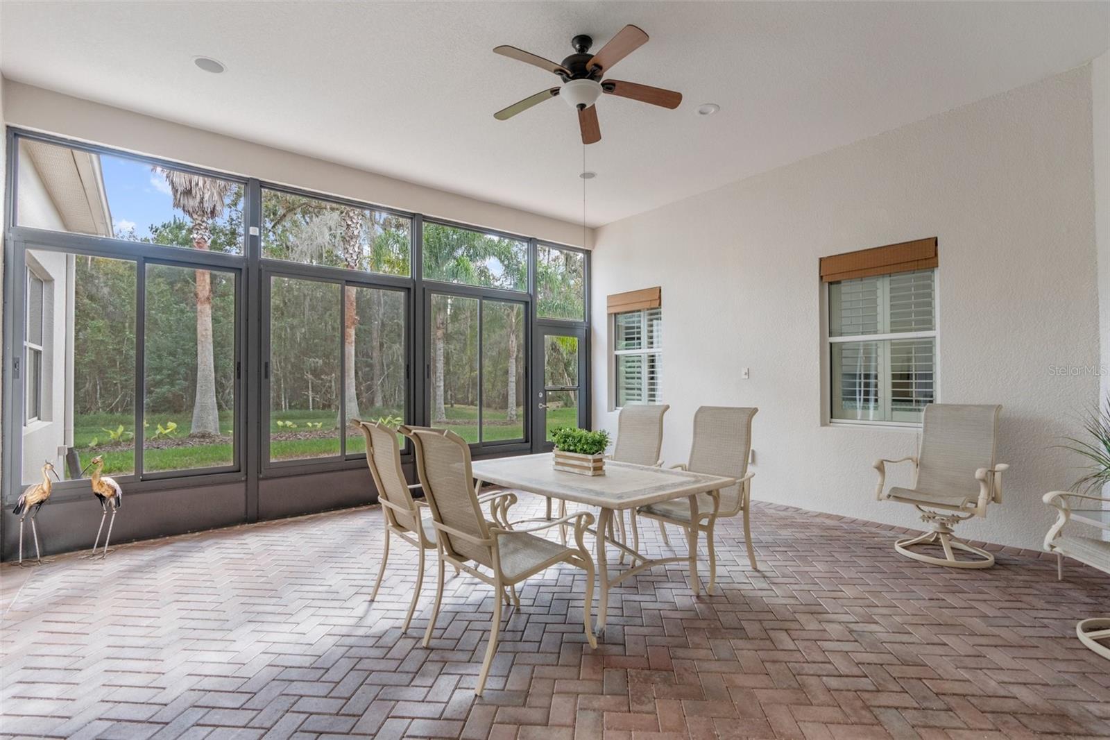 Air conditioned lanai with full vinyl windows. Sound speaker in place.