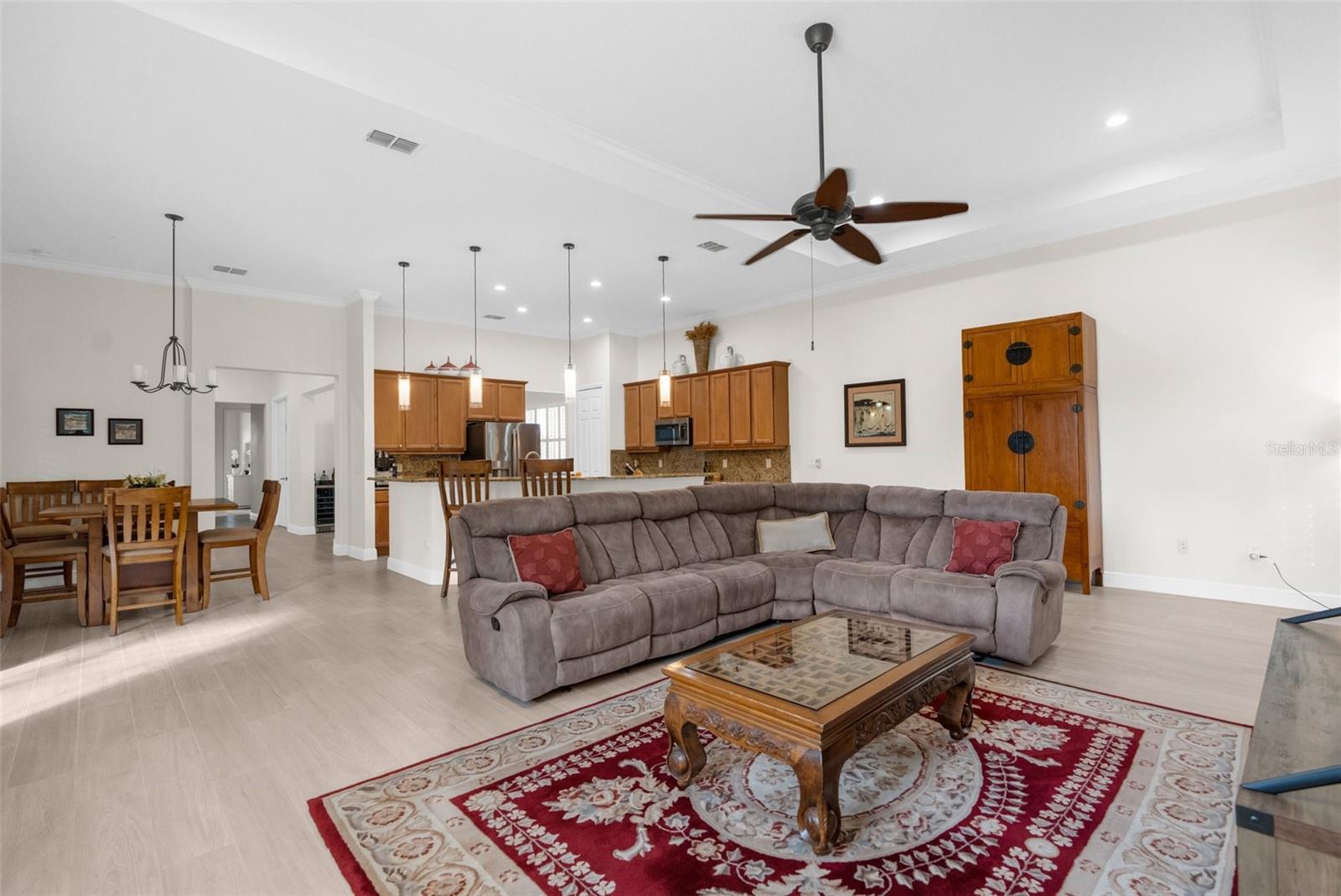 Huge family room area with tray ceiling. Flush mount speakers in place.