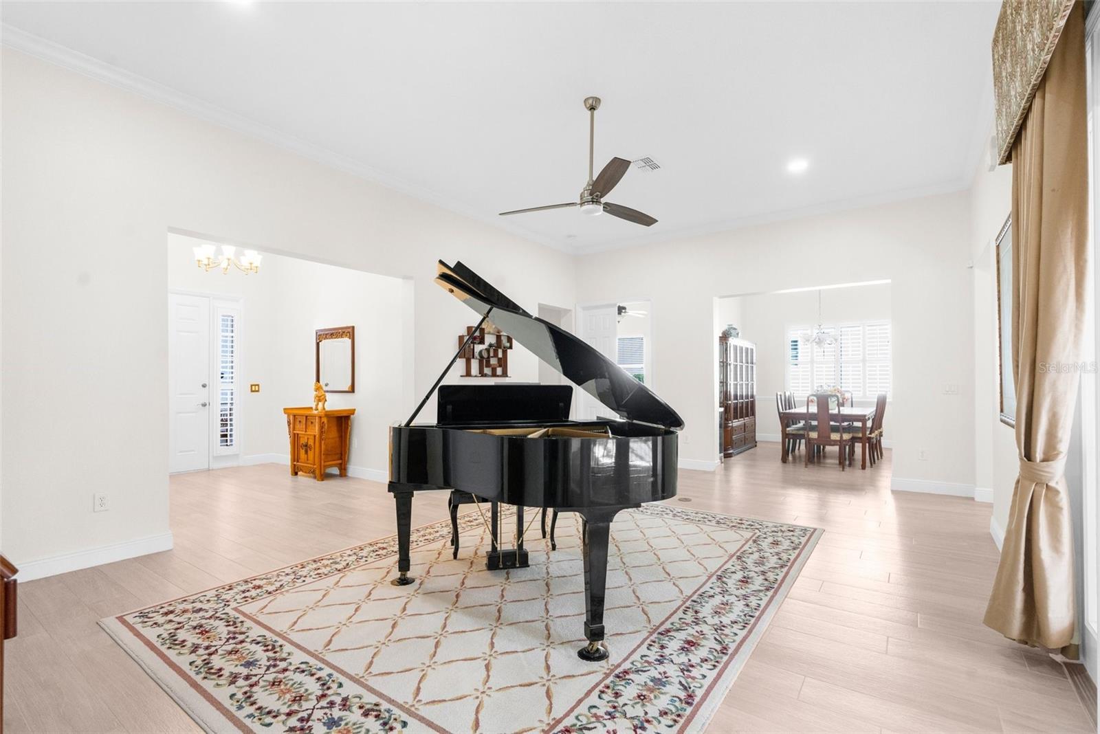 Huge living room with 12 foot high ceilings throughout the whole house.
