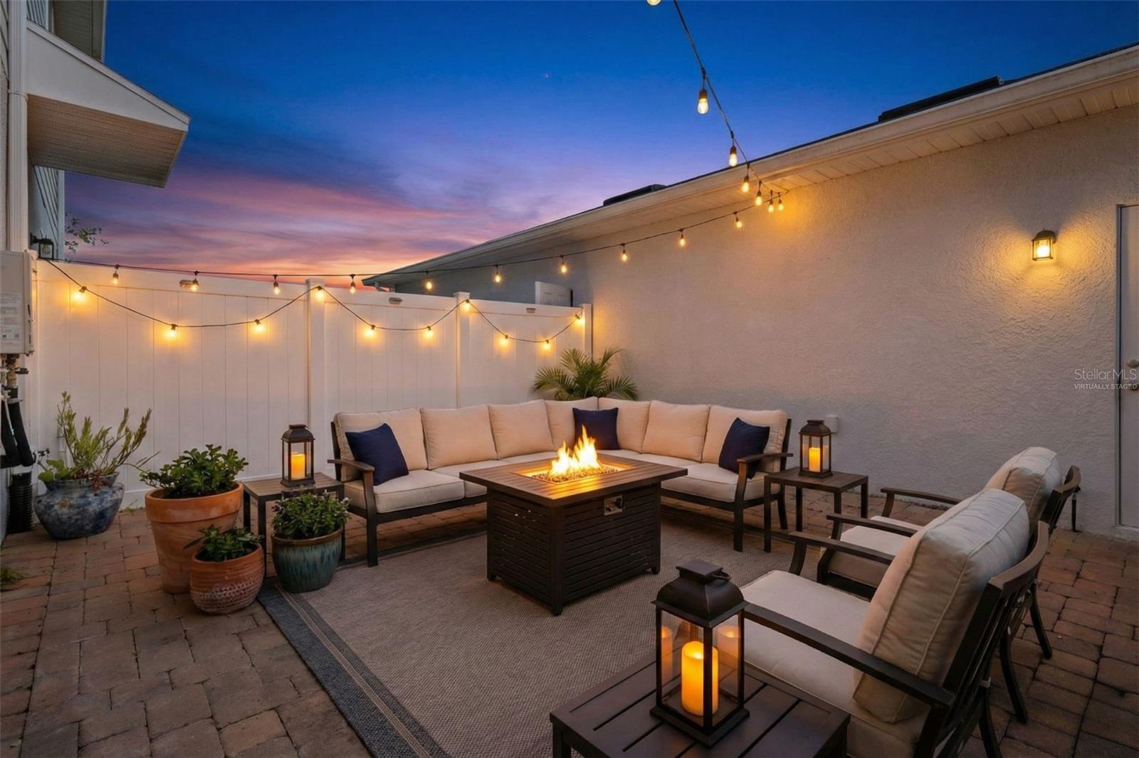 Courtyard leading to 2 car garage - virtually staged