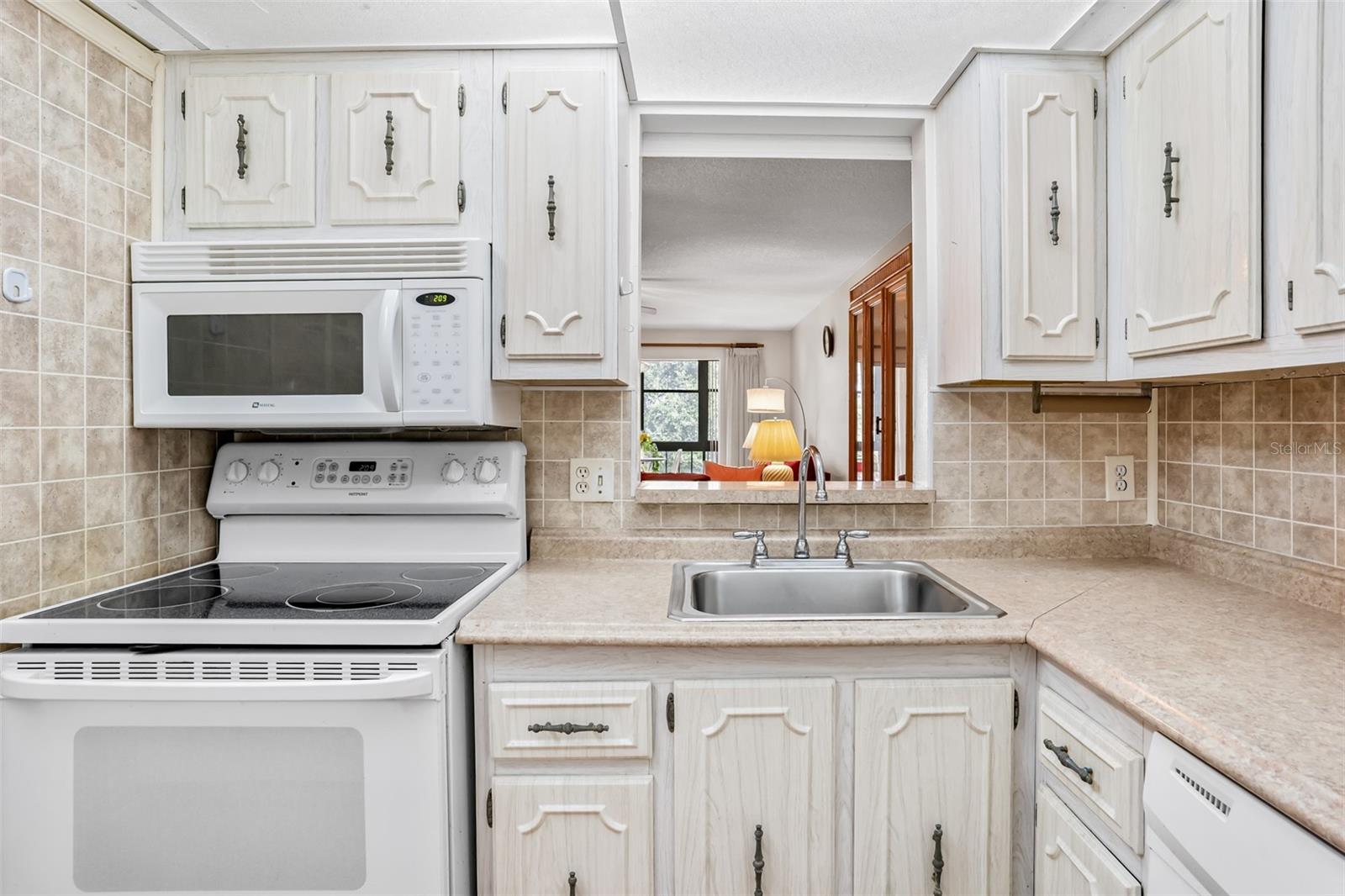 Clean Kitchen with plenty of Cabinets