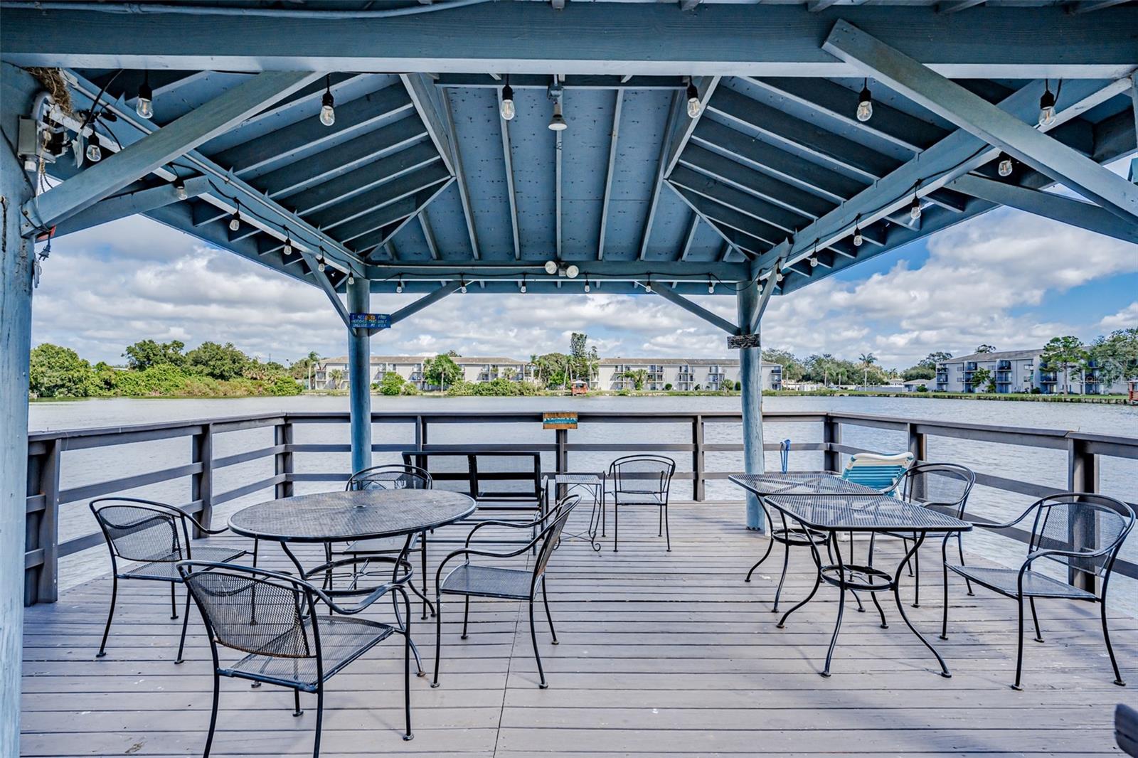 Covered seating area on the lake