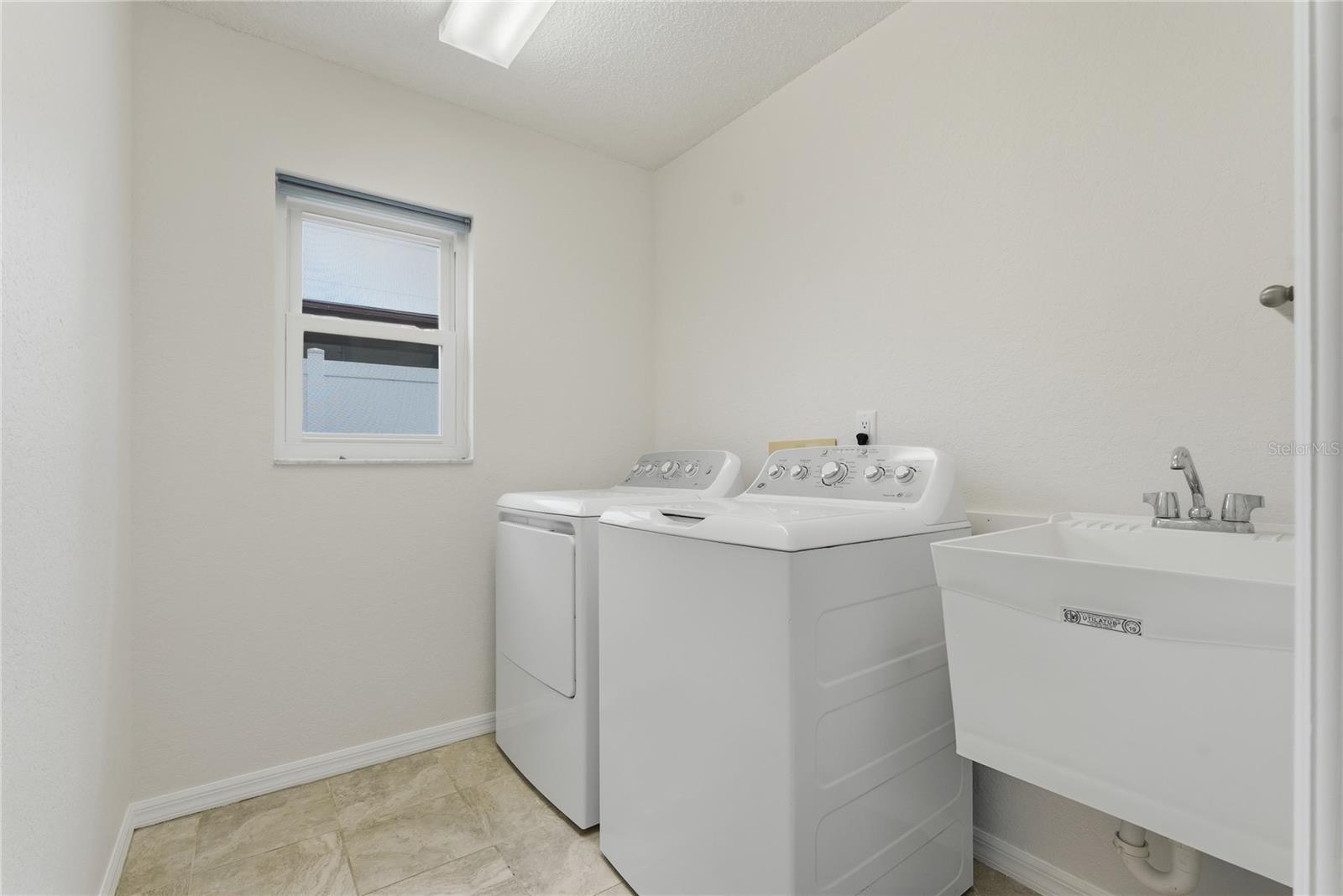 Laundry Room with Included Washer and Dryer