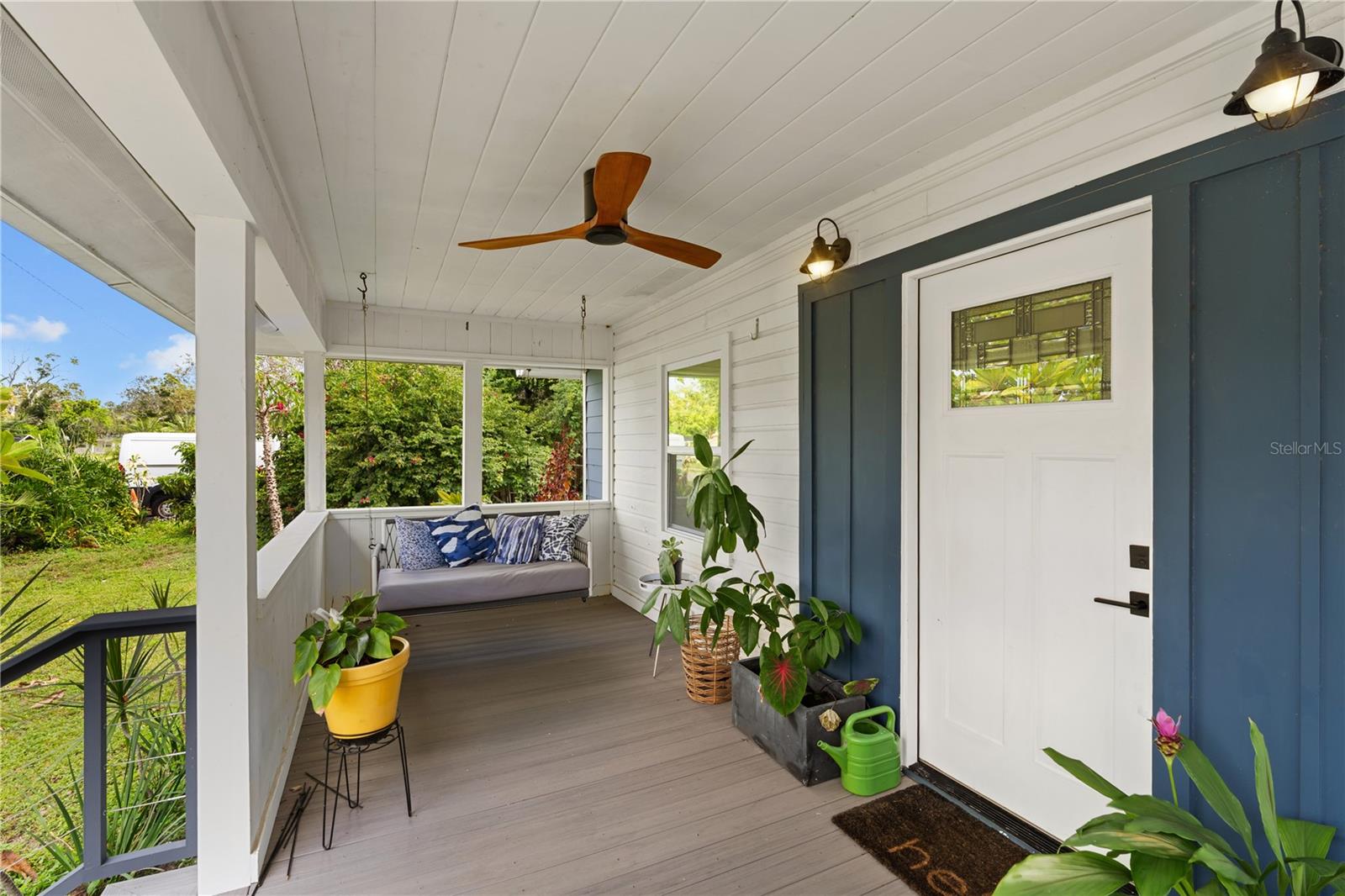 Trex decking front porch with bench swing