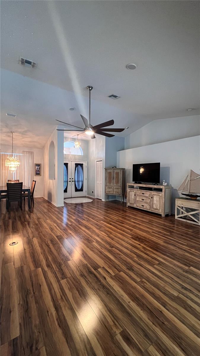 Great room front entrance, living and dining areas
