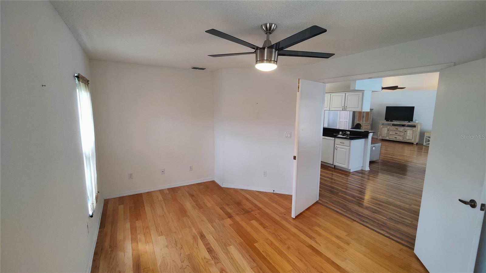 Den/Office/hobby room or third bedroom has a double door that opens to the kitchen/great room.