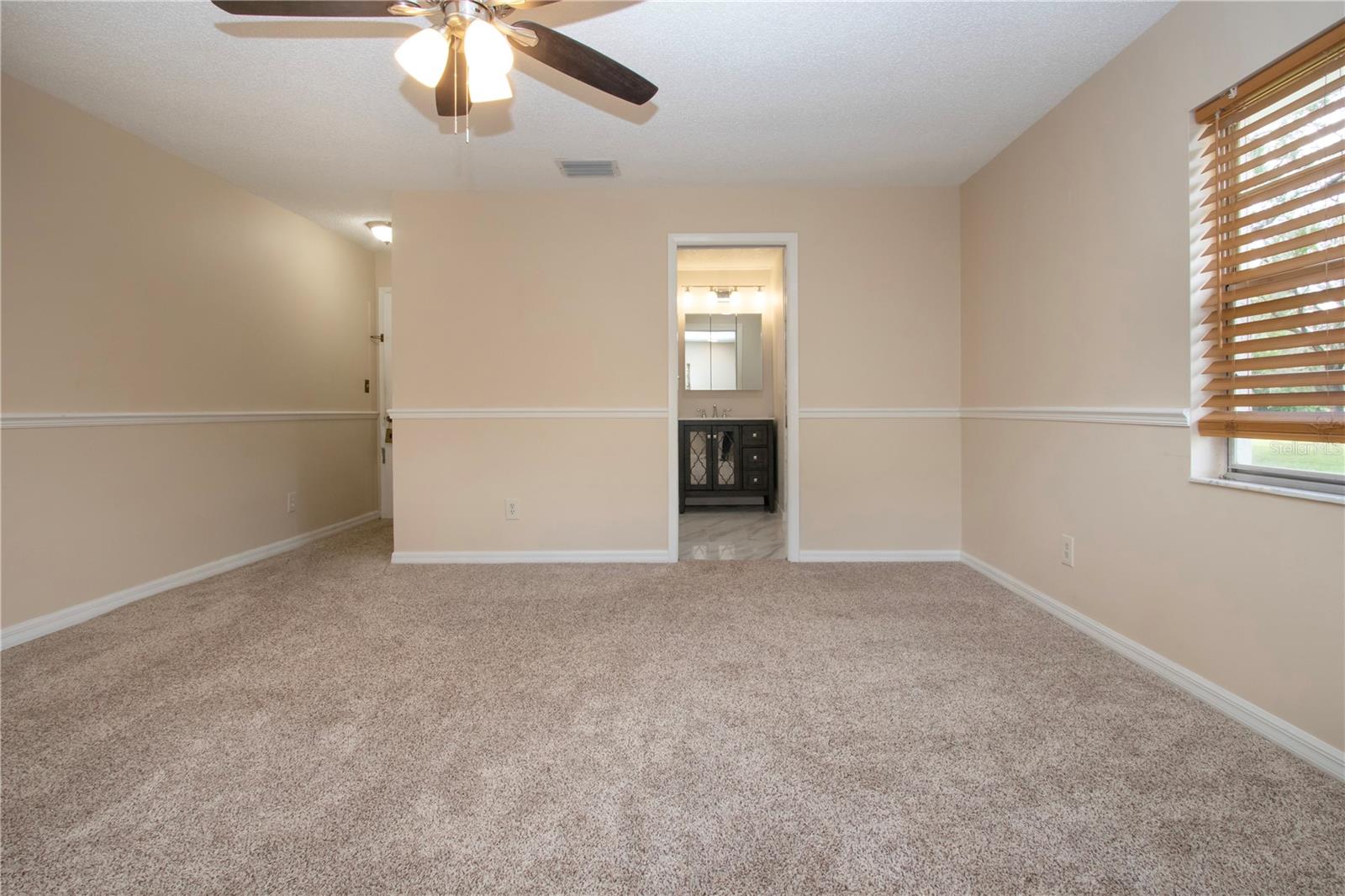 Primary bedroom with new carpet