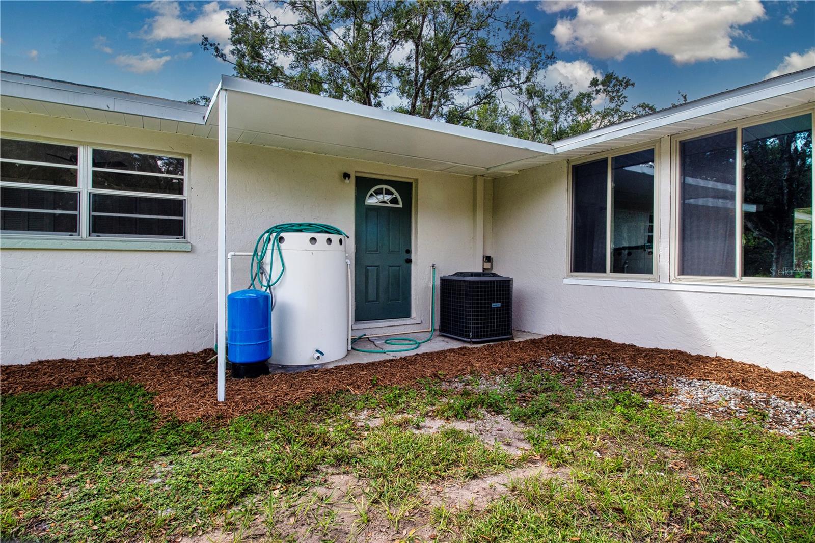 This door leads into the laundry/utility room