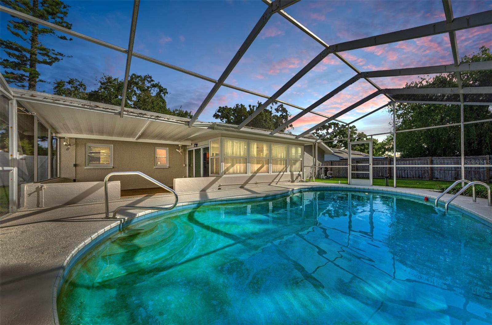 INGROUND POOL WITH SCREENED BIRD CAGE