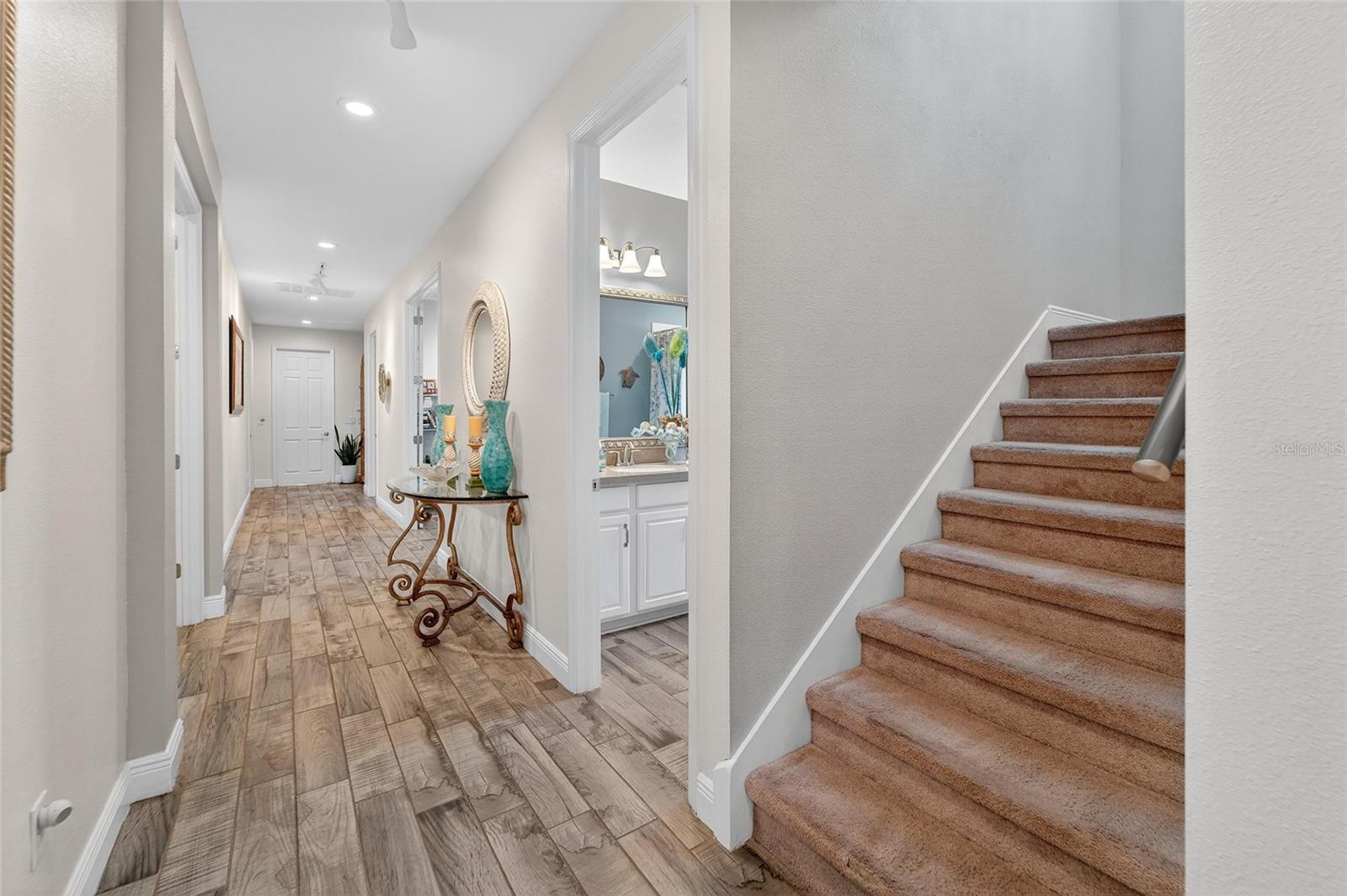 Hallway to Primary Bedroom & Laundry