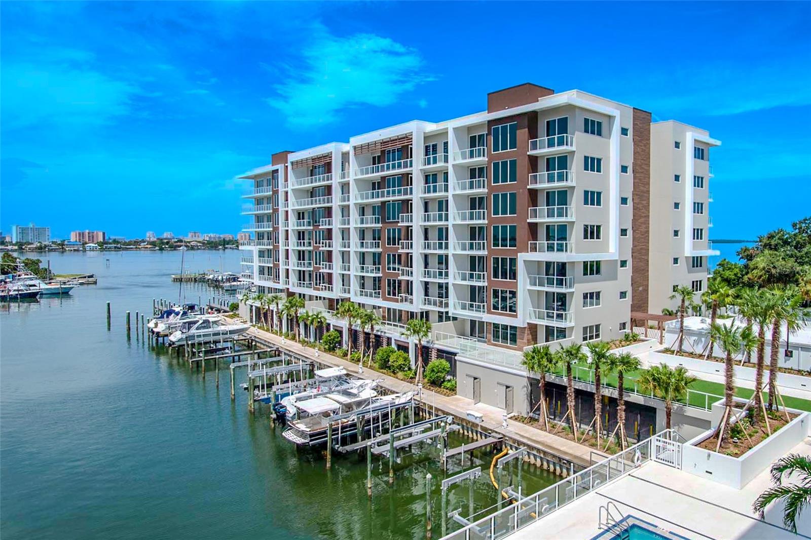 Marina Bay 880 offers breathtaking waterfront views, showcased through expansive floor-to-ceiling windows and sleek glass railings that ensure an uninterrupted connection to the sparkling Intracoastal below. Spacious terraces invite seamless indoor-outdoor living, allowing you to soak in the beauty of the marina, passing yachts, and vivid coastal skyline from every angle.