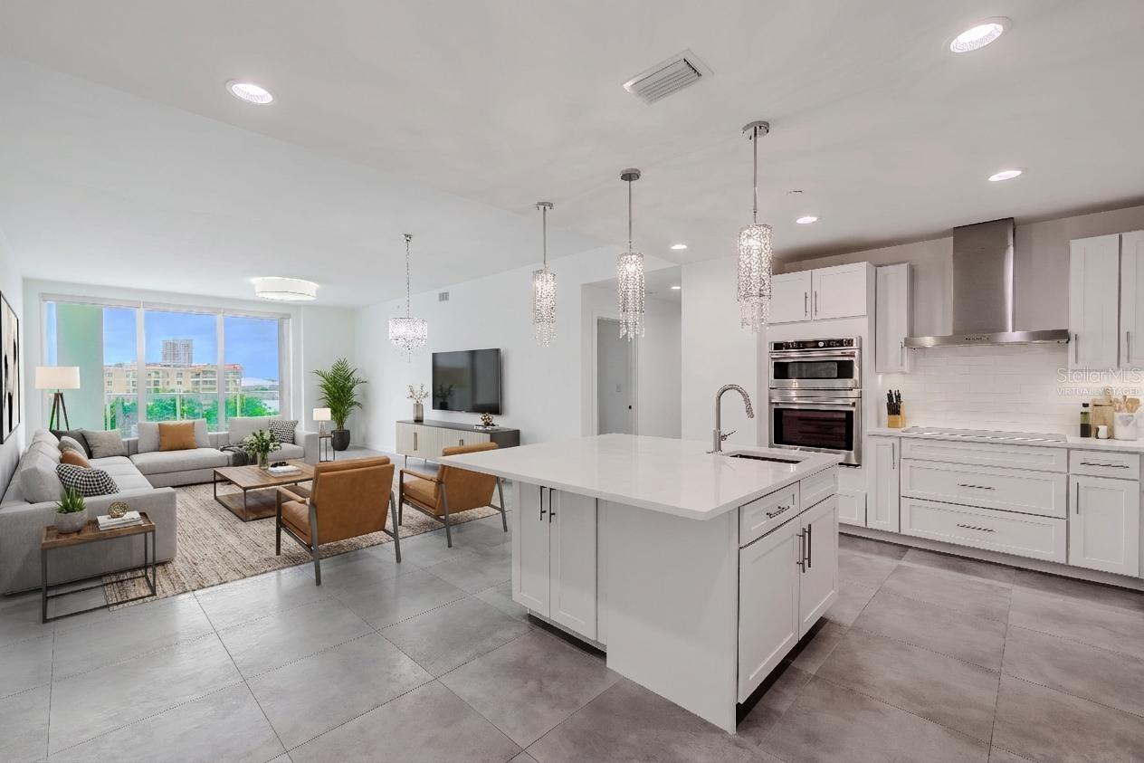 Perched on the 7th floor of Marina Bay 880, this 3-bedroom, 4-bath luxury penthouse-style residence showcases stunning panoramic views of the Intracoastal Waterway and marina below. Designed for refined coastal living, the residence includes two assigned parking spaces (#88 and #45) within a secure garage for added convenience. Virtually staged photo.