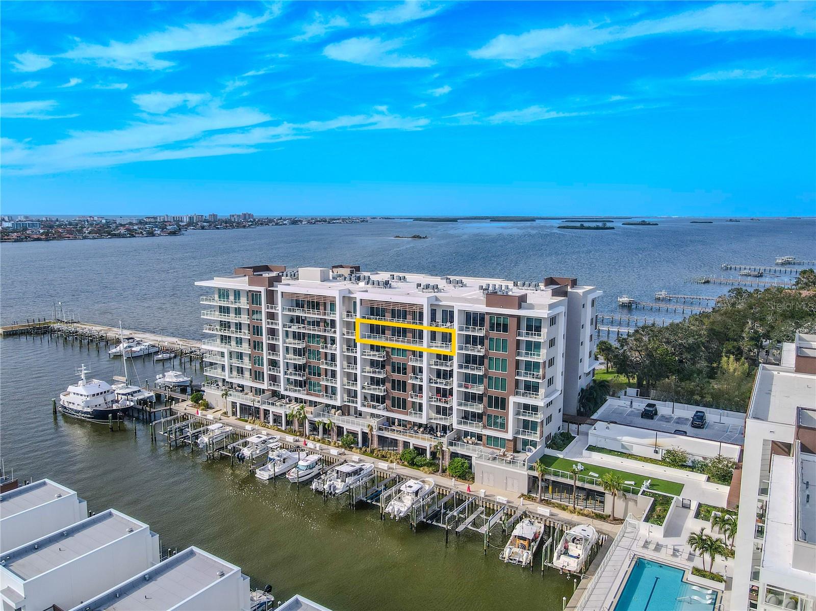Perched on the 7th floor of Marina Bay 880, this 3-bedroom, 4-bath luxury penthouse-style residence showcases stunning panoramic views of the Intracoastal Waterway and marina below. Designed for refined coastal living, the residence includes two assigned parking spaces (#88 and #45) within a secure garage for added convenience.