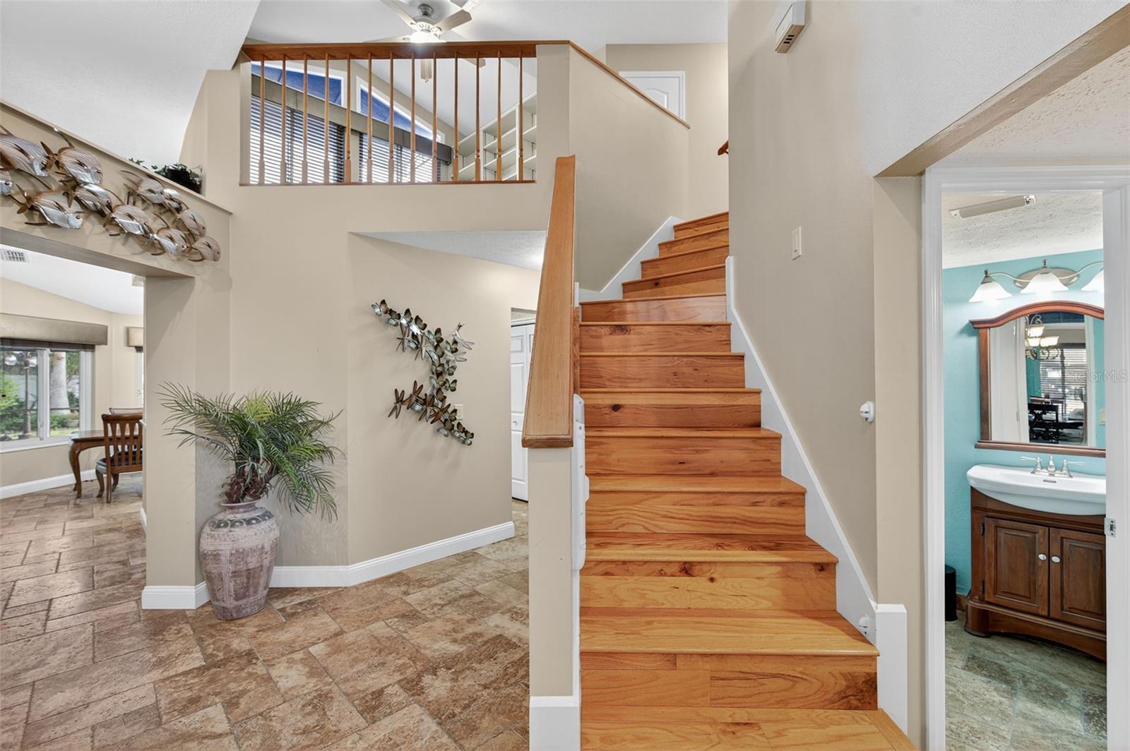 stairway to upstairs loft/office and bedrooms