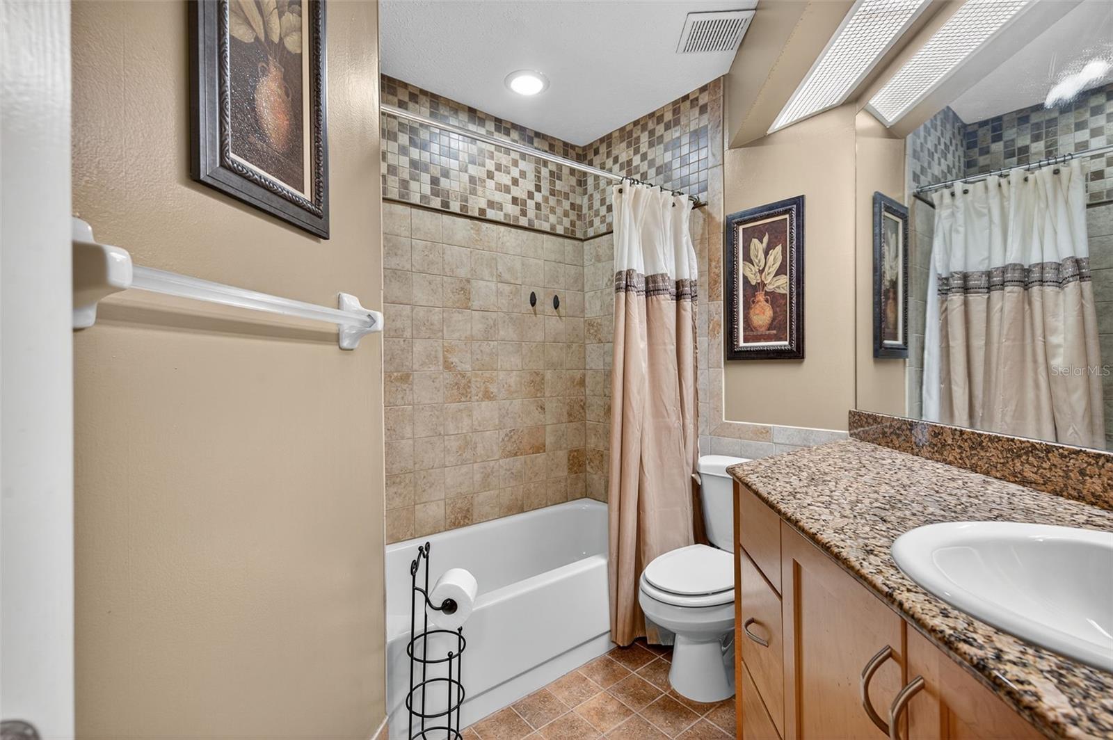 1st upstairs bedroom with 2nd full private bathroom