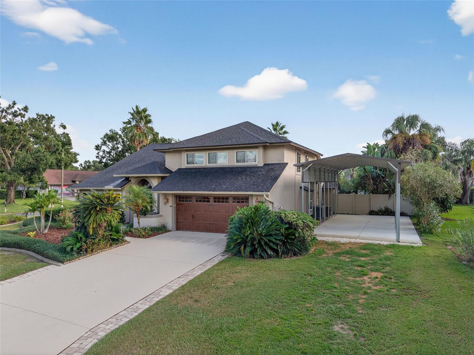 front with view of new mobile home covered pad
