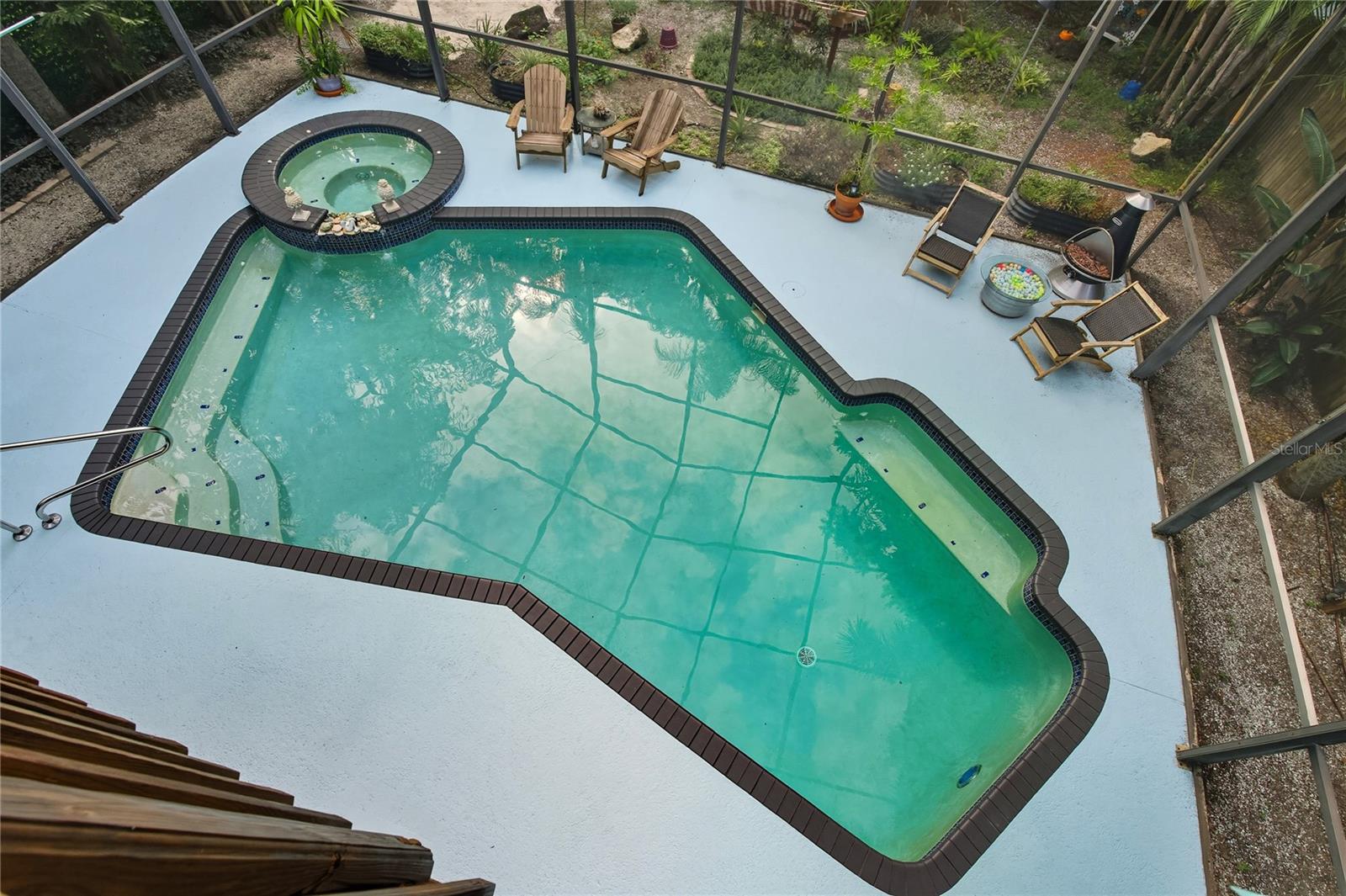 OVERLOOKING THE POOL FROM THE PRIMARY SUITE BALCONY!