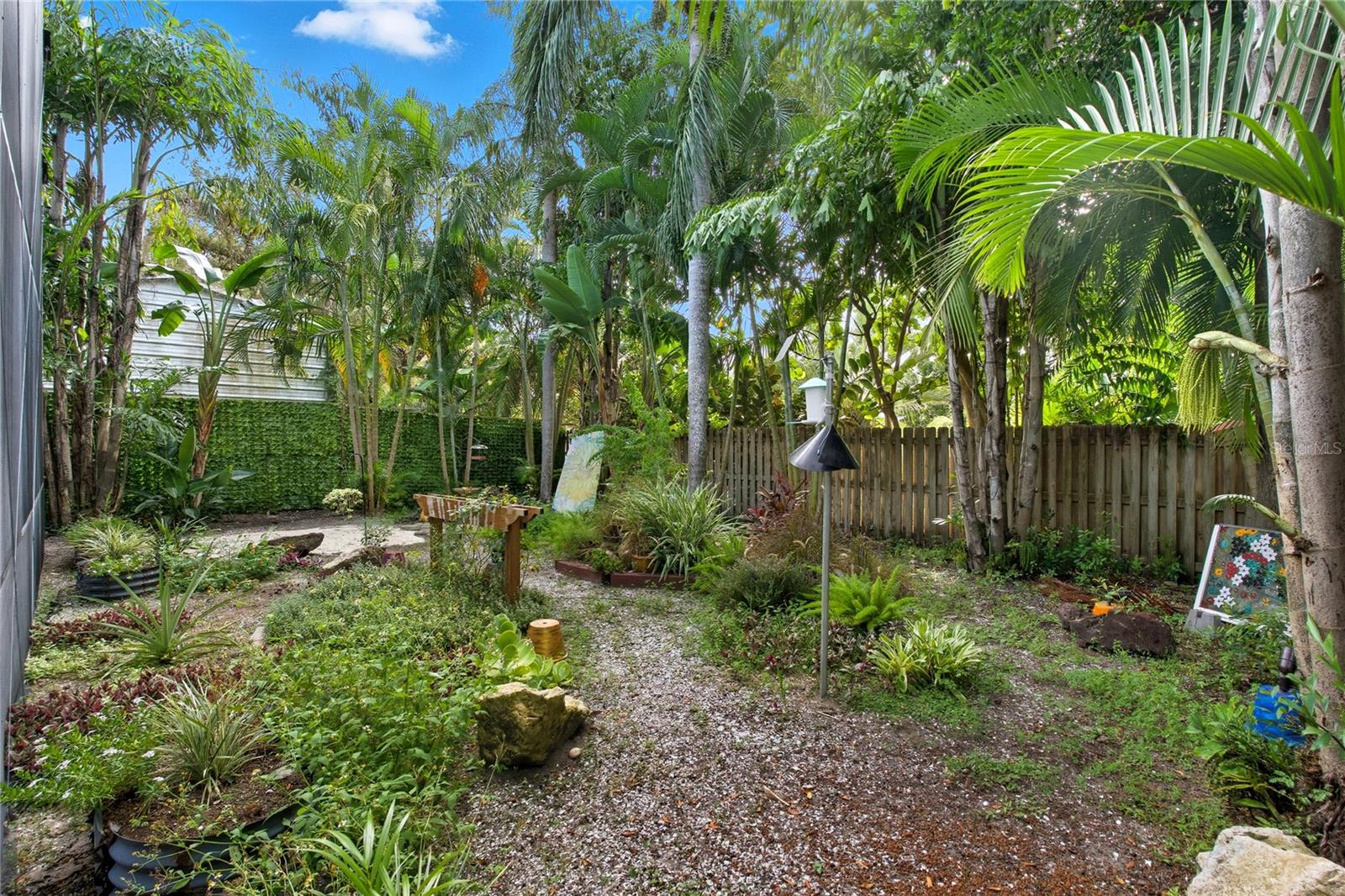 PLENTY OF SPACE TO CREATE ~ WHAT A PRIVATE & COOL BACKYARD DOWNTOWN OZONA!