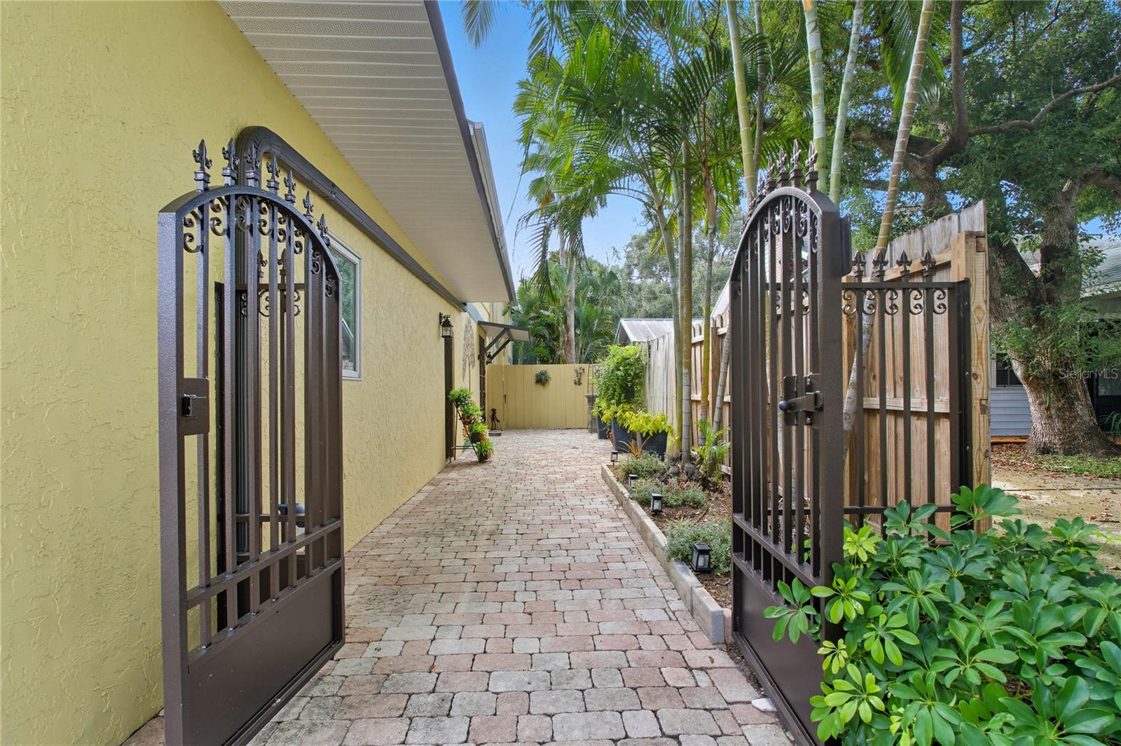 GORGEOUS, WROUGHT-IRON GATE ENTRY, UNIQUE HOME LIKE NO OTHER!