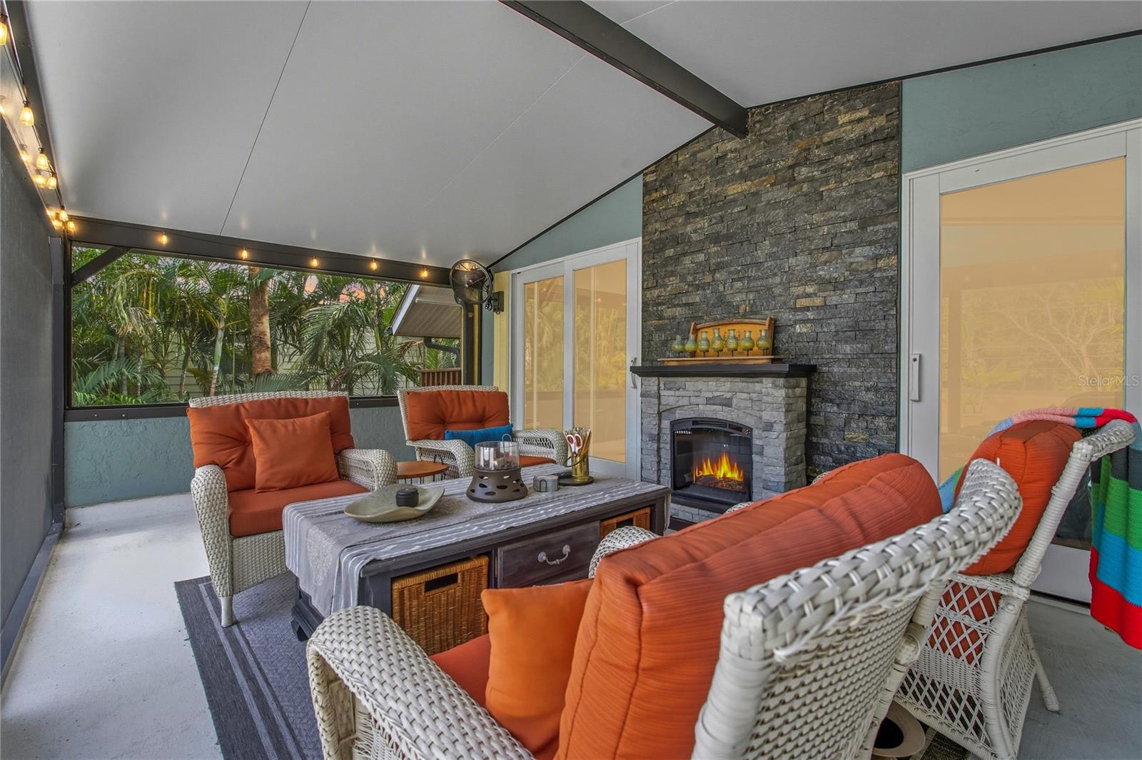 YOUR ROOFTOP PATIO HAS OPEN SPACE IN ADDITION TO A COVERED, SCREENED-IN SPACE AS WELL. GREAT FOR ENTERTAINING