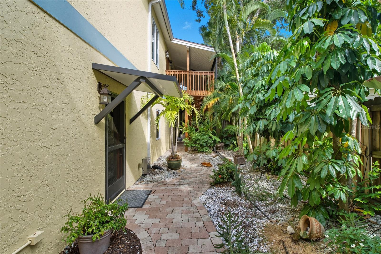 YOU CAN TAKE A SIDEWALK ALL THE WAY AROUND THE HOME!