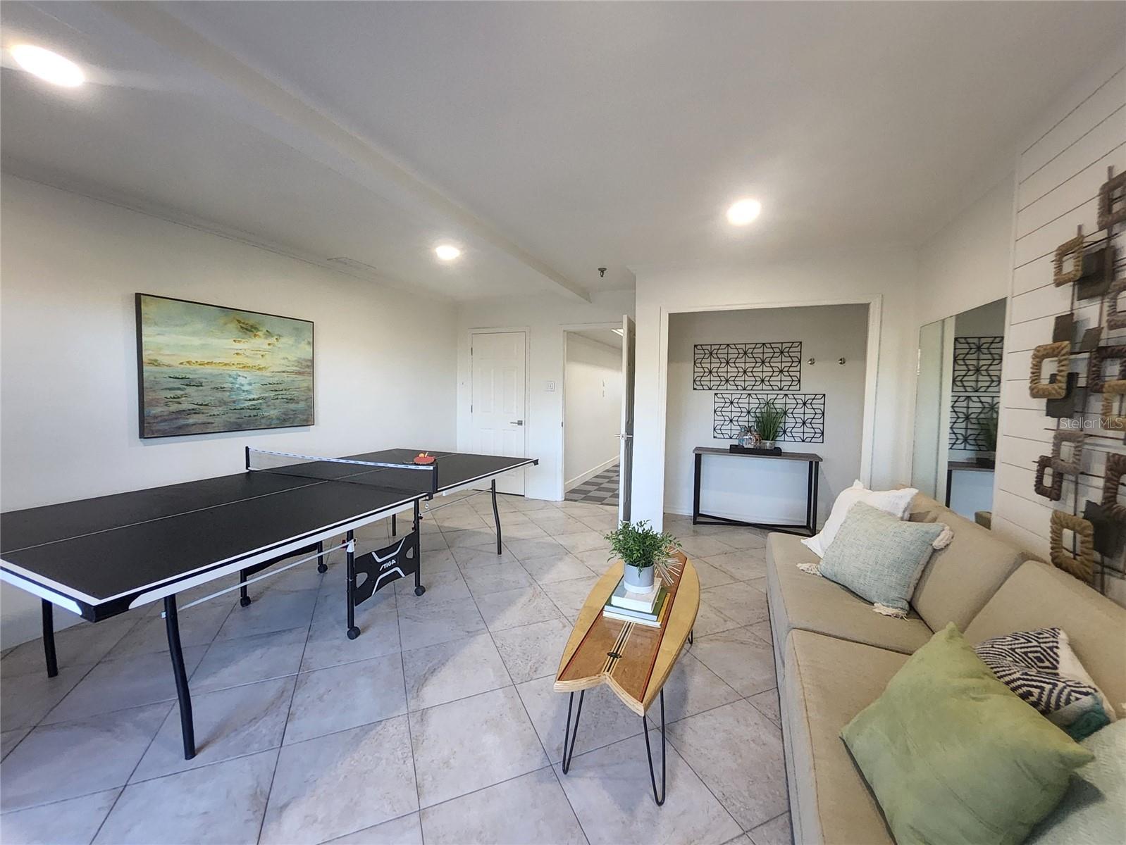 Bonus room with tile flooring