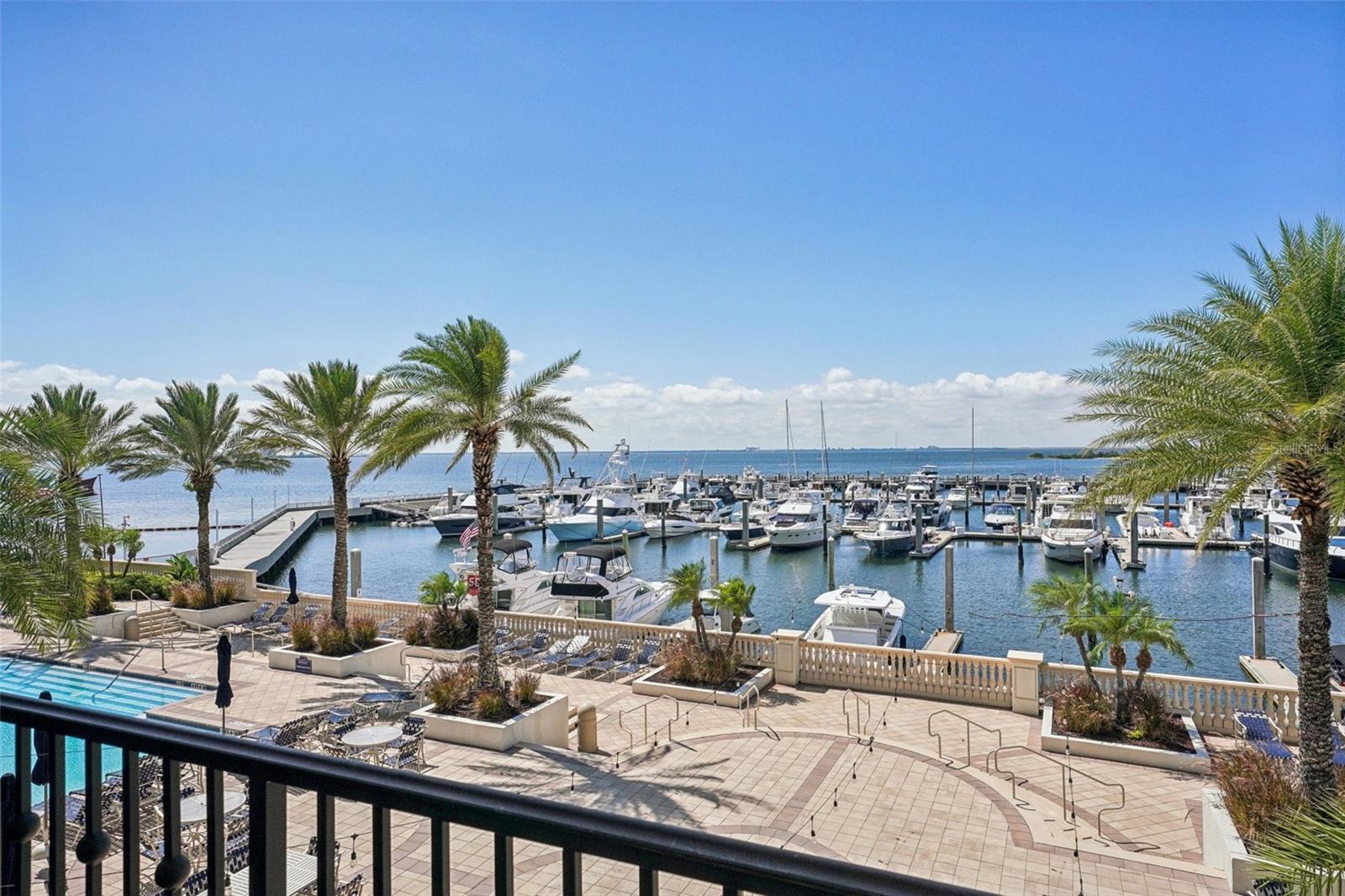 Only a handful of condos in Tampa offer this combination of direct bay views, double garage, and private marina access