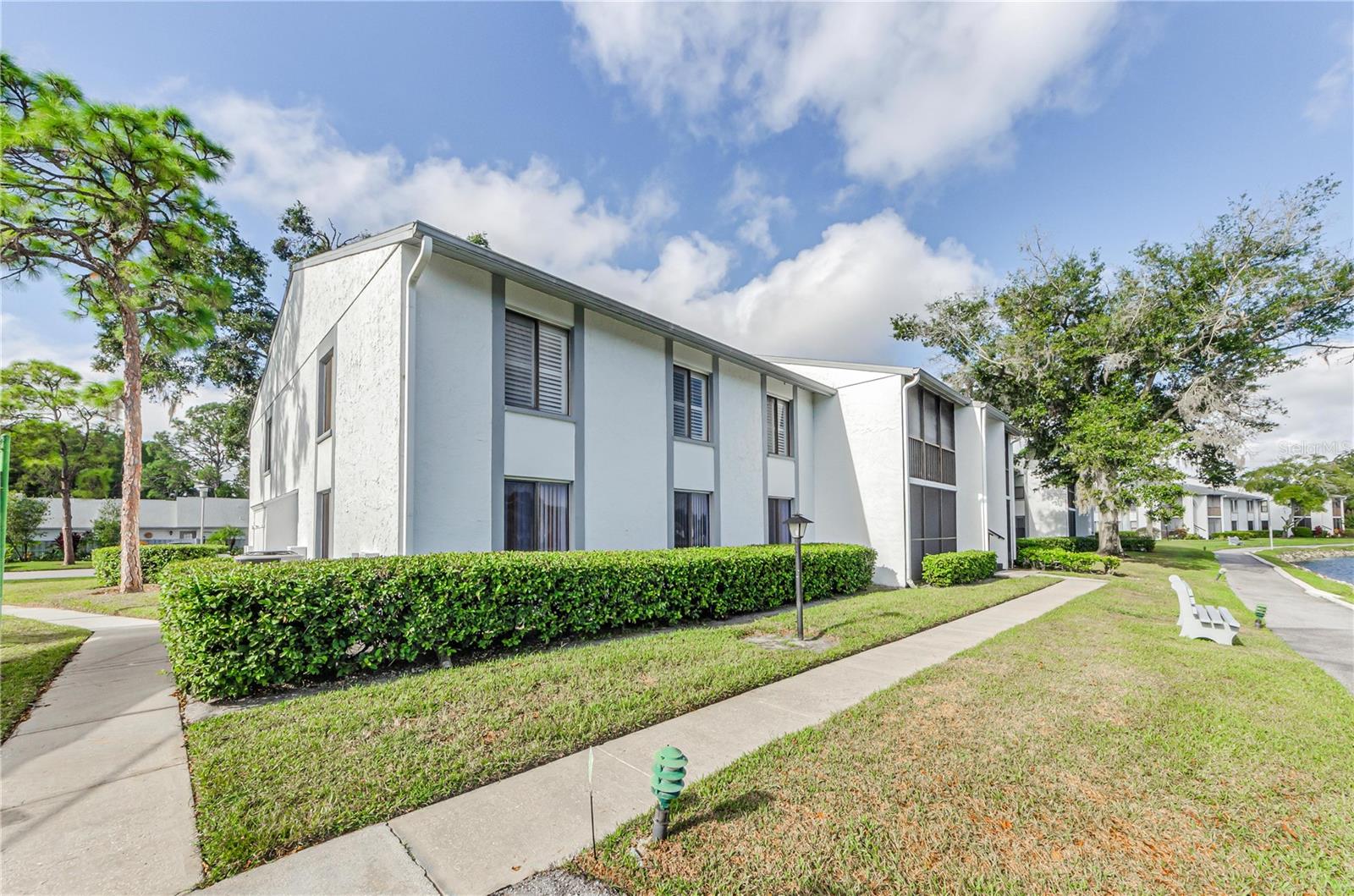 Sidewalk leading to unit