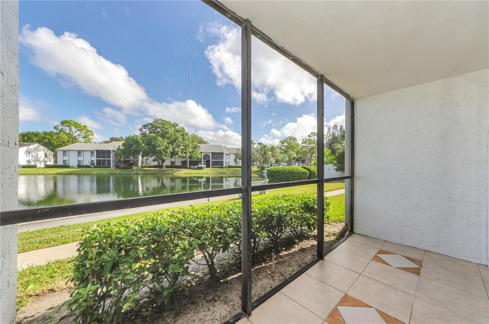 Screened lanai with pond view
