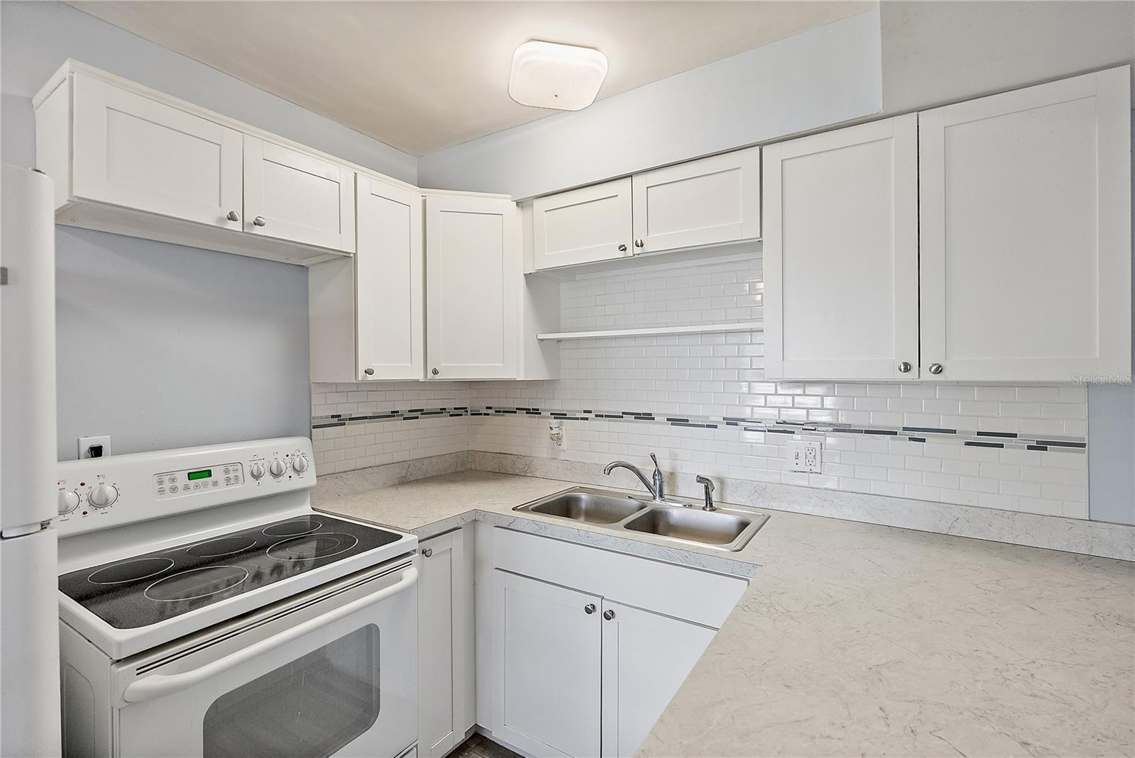 Updated - OPEN Kitchen had wall removed to open things up