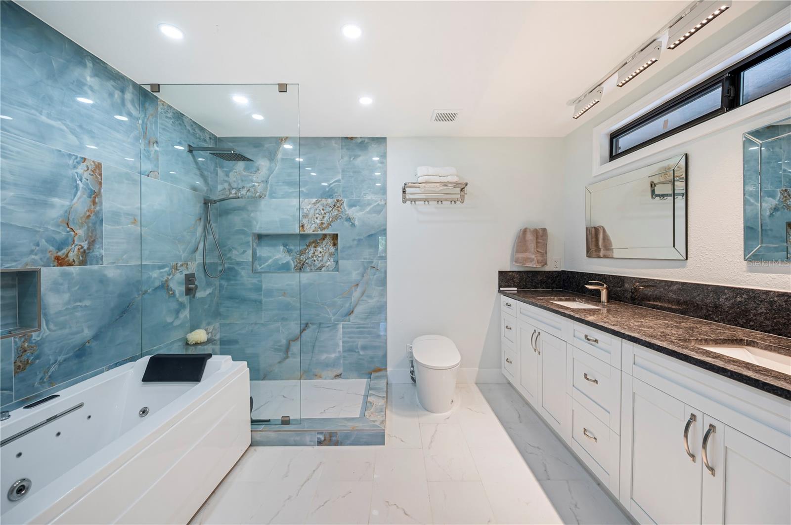 steam shower & jacuzzi tub, feels like a spa!