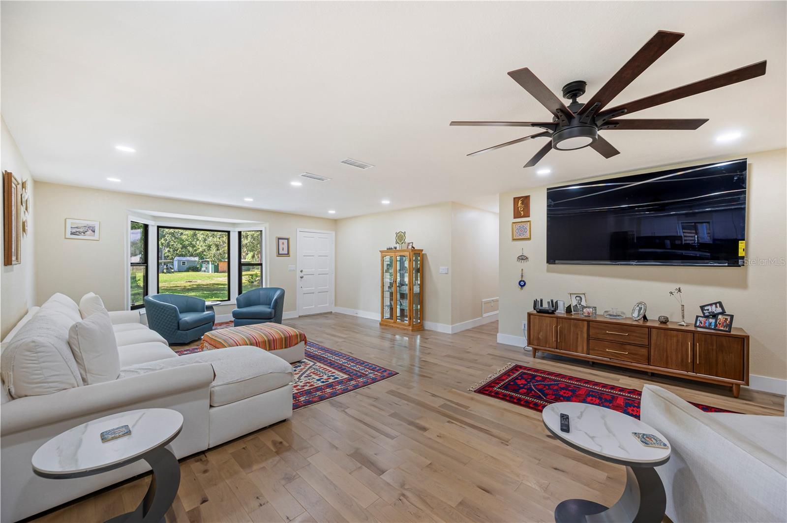 Living room has a beautiful bay window