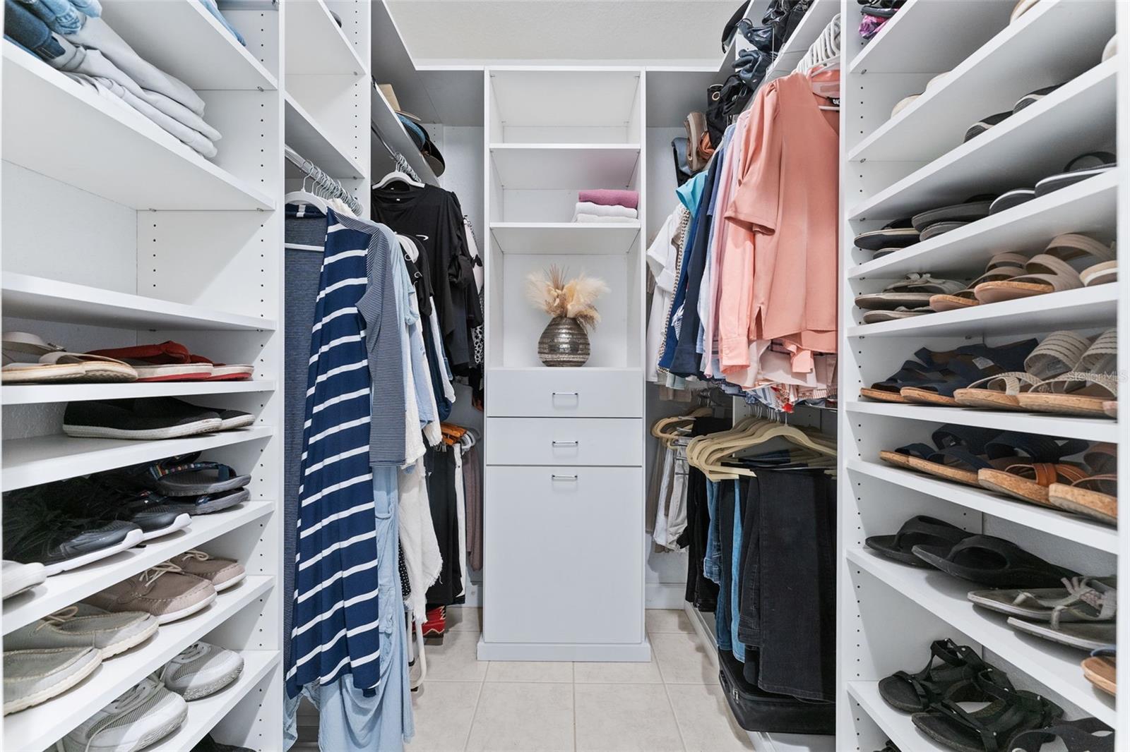 Custom Walk In Closet in the Primary bedroom.  Amazing storage.