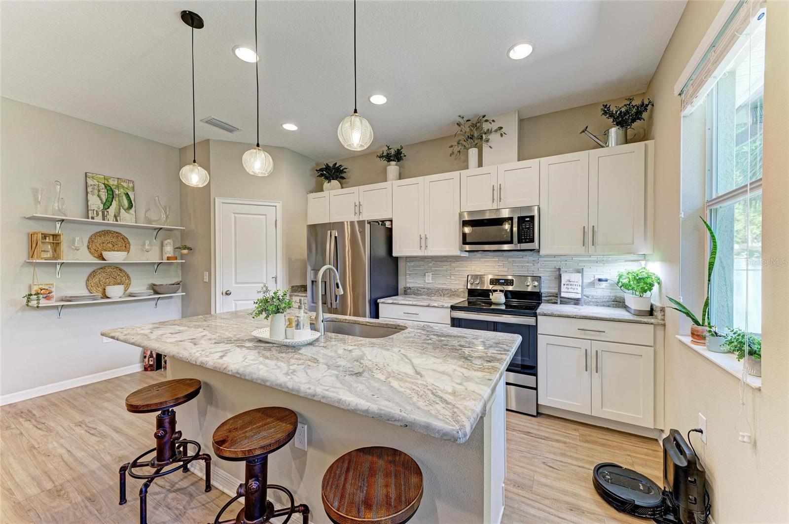 Large center island and 3 bar stools