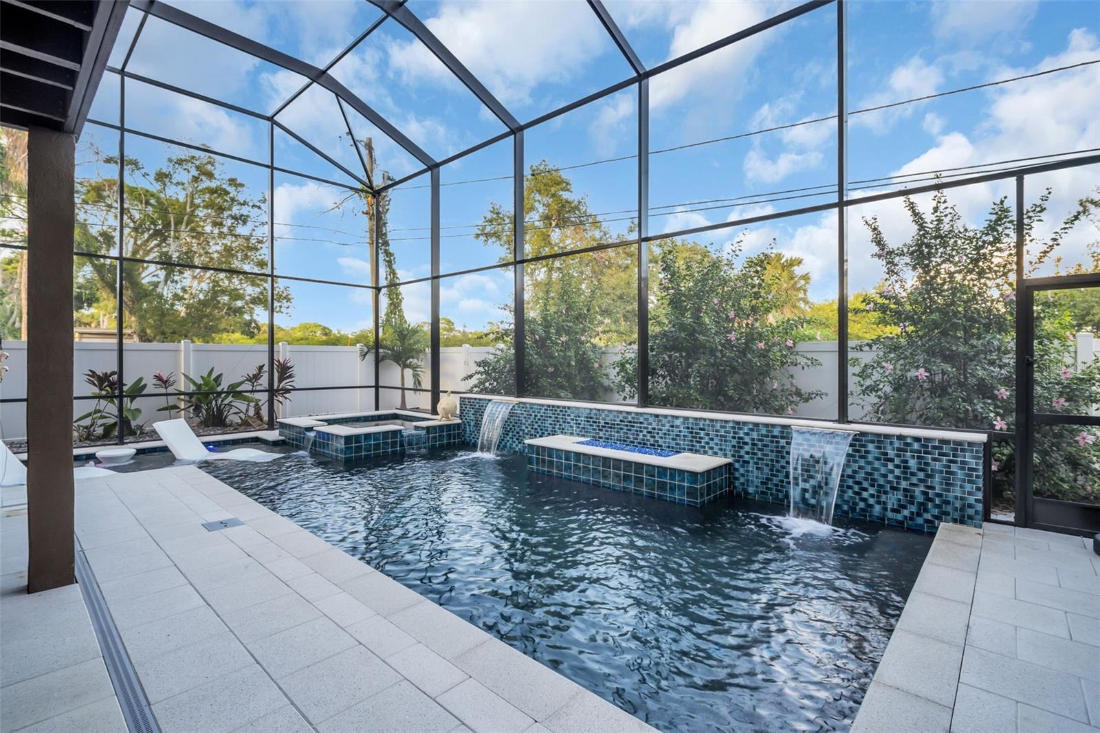 Waterfall and fire feature in pool