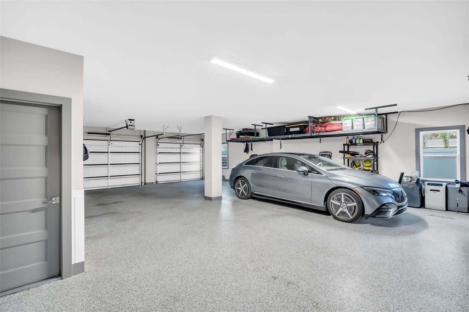Over sized 4 car garage on groundfloor.