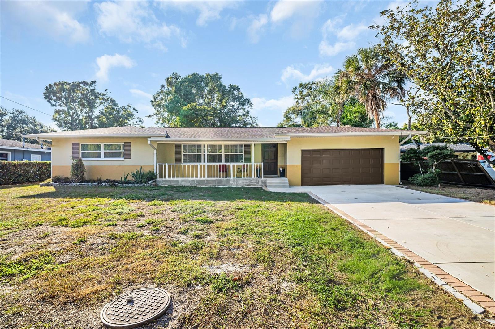 Front View-New Garage door and Driveway
