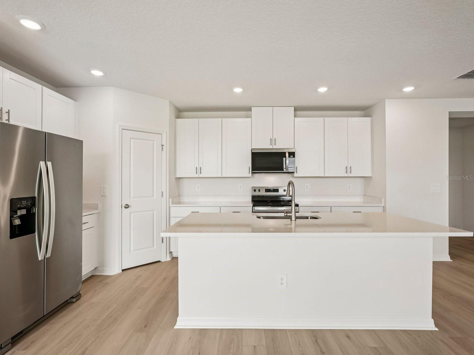 Interior photos are not of the actual home but are photos of the builder home with same floorplan with similar interior finishes and features.