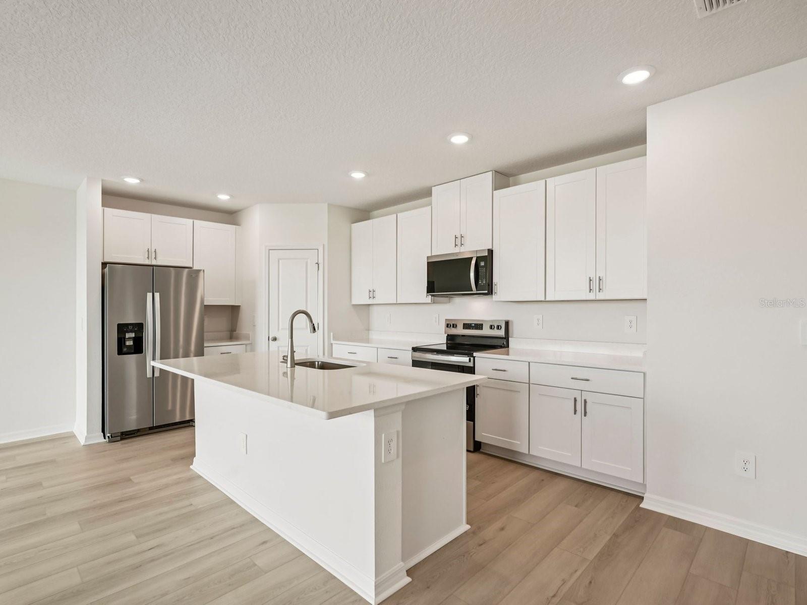 Interior photos are not of the actual home but are photos of the builder home with same floorplan with similar interior finishes and features.